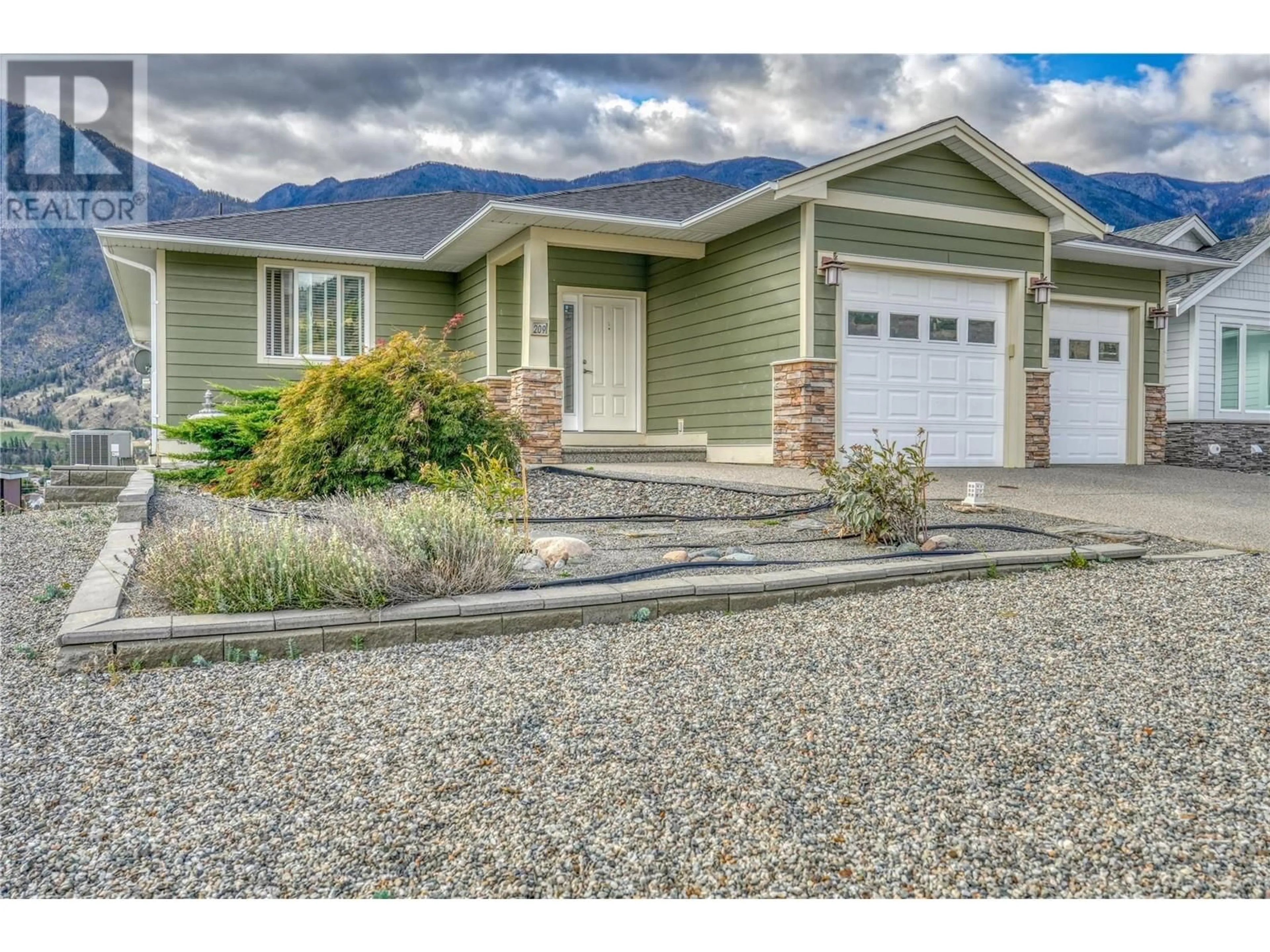 Home with vinyl exterior material, street for 209 K VIEW CRESCENT, Keremeos British Columbia V0H1N2