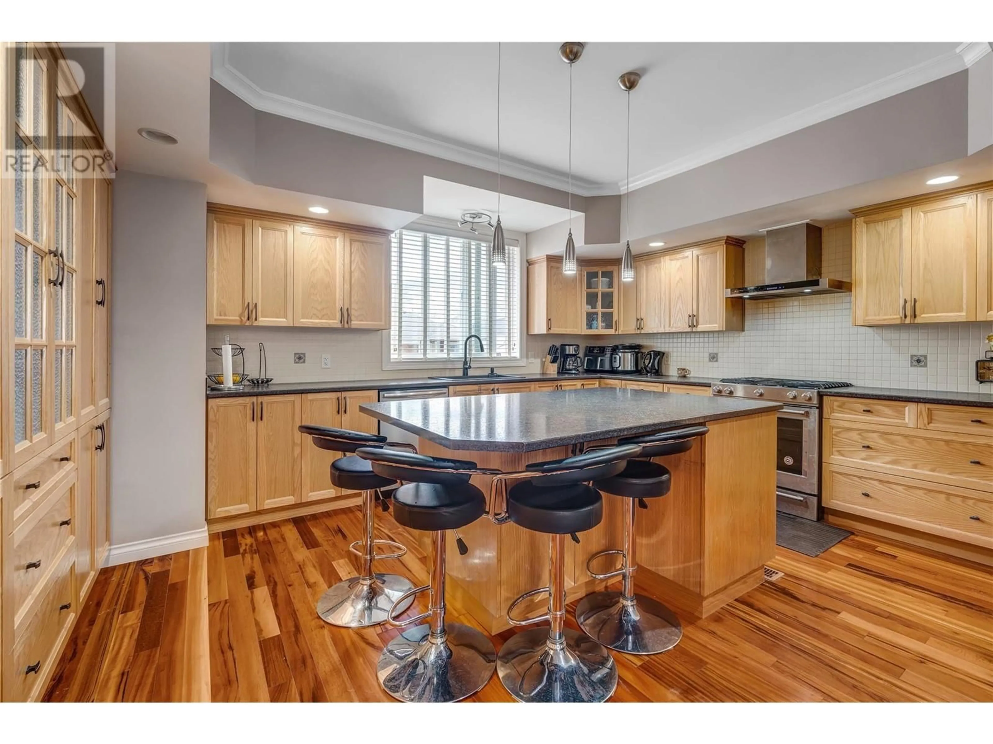 Open concept kitchen, wood/laminate floor for 209 K VIEW CRESCENT, Keremeos British Columbia V0H1N2