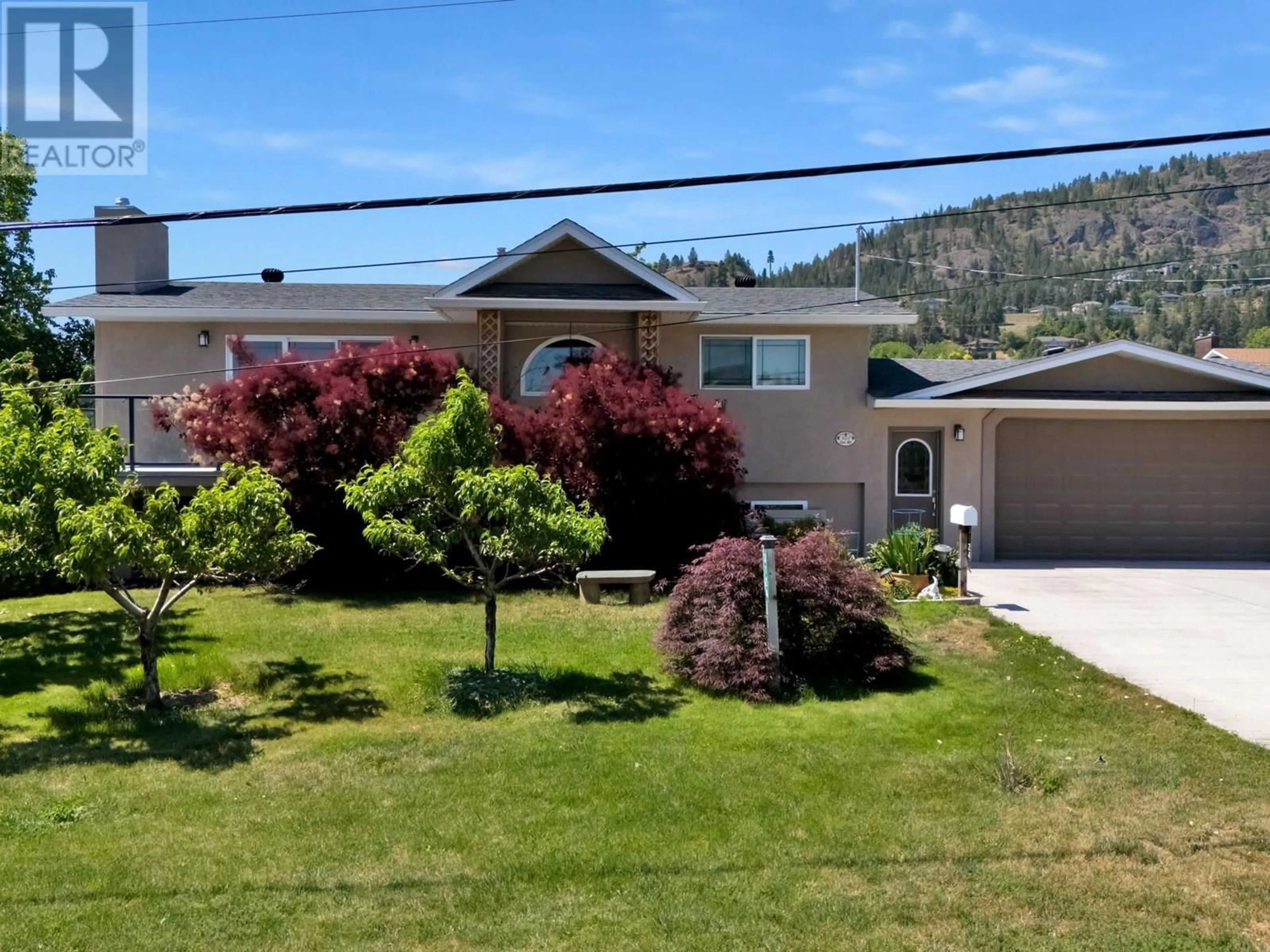 A pic from outside/outdoor area/front of a property/back of a property/a pic from drone, mountain view for 3124 COX ROAD, West Kelowna British Columbia V1Z2B4