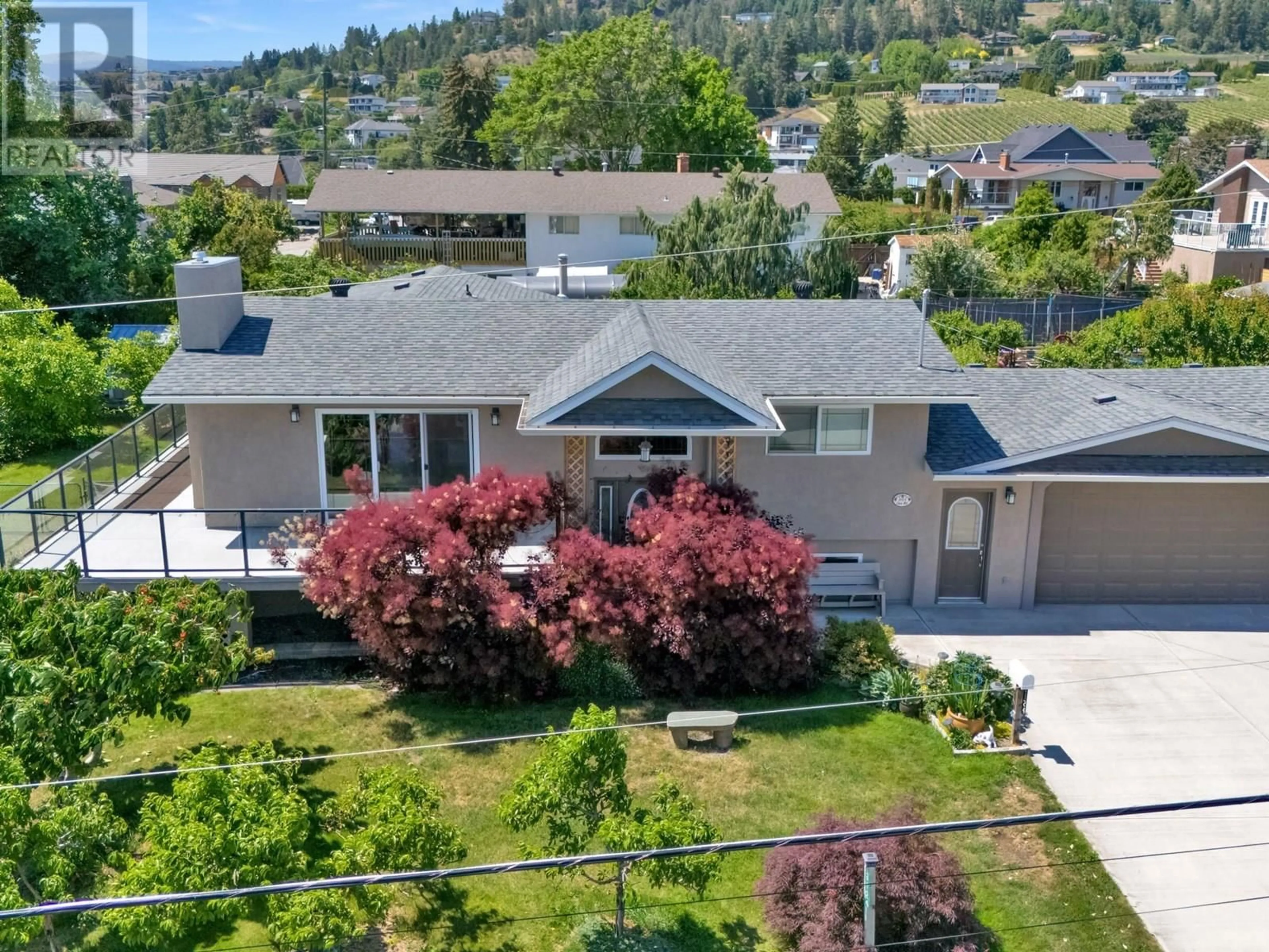 A pic from outside/outdoor area/front of a property/back of a property/a pic from drone, mountain view for 3124 COX ROAD, West Kelowna British Columbia V1Z2B4