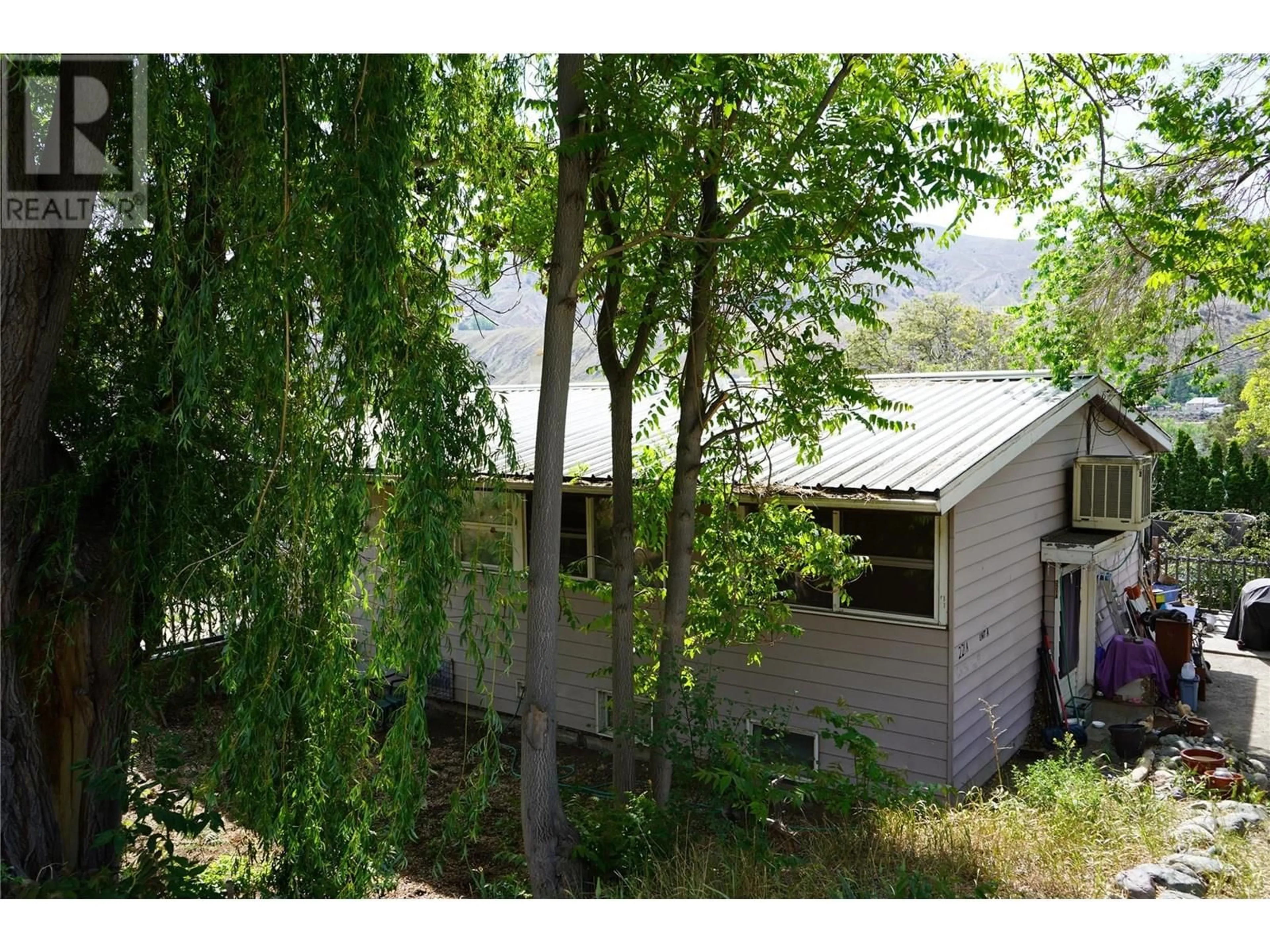 A pic from outside/outdoor area/front of a property/back of a property/a pic from drone, forest/trees view for 221 GOVERNMENT STREET, Ashcroft British Columbia V0k1A0