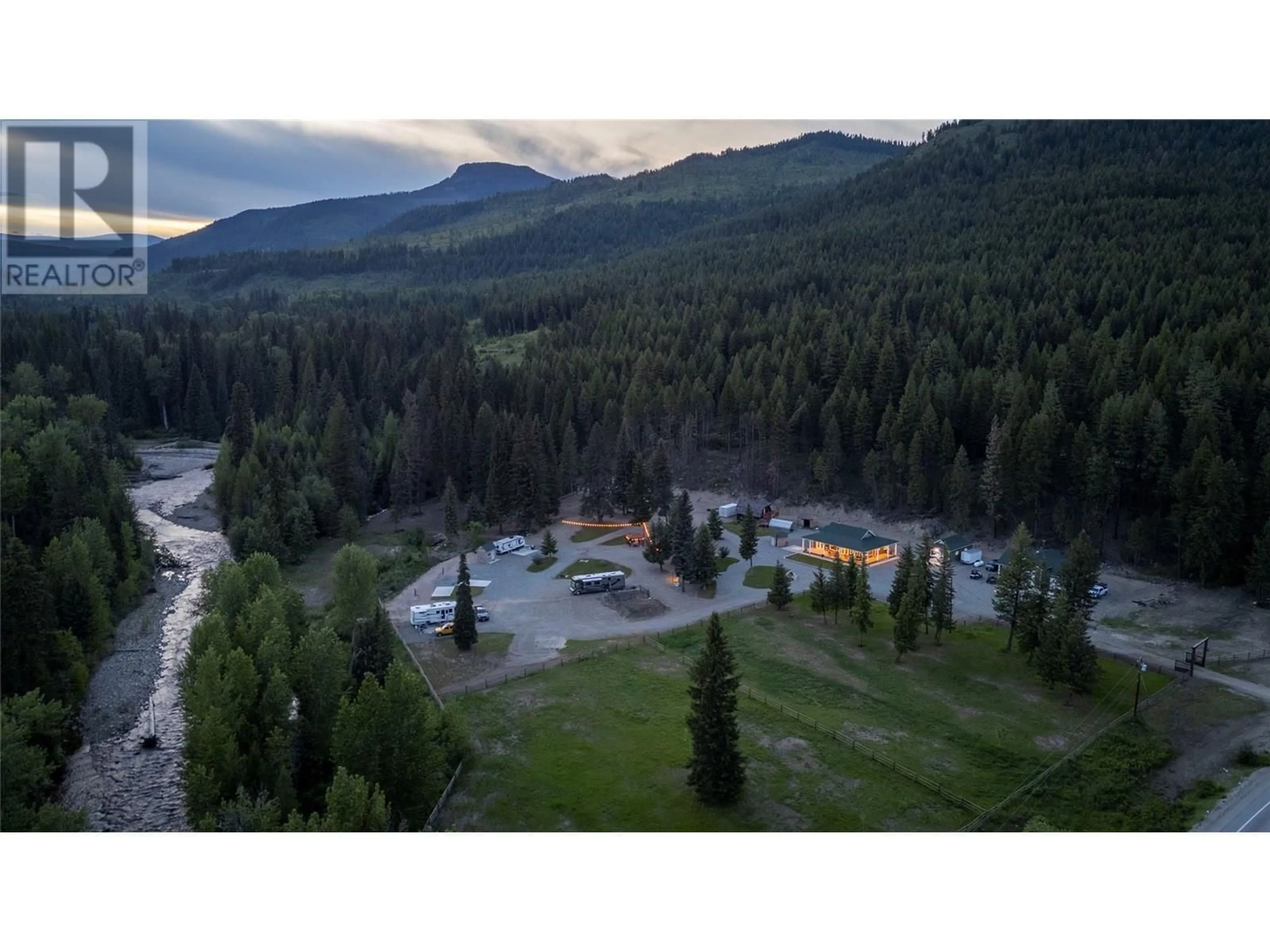 A pic from outside/outdoor area/front of a property/back of a property/a pic from drone, mountain view for 6645 HIGHWAY 33 HIGHWAY, Carmi British Columbia V0H1A0