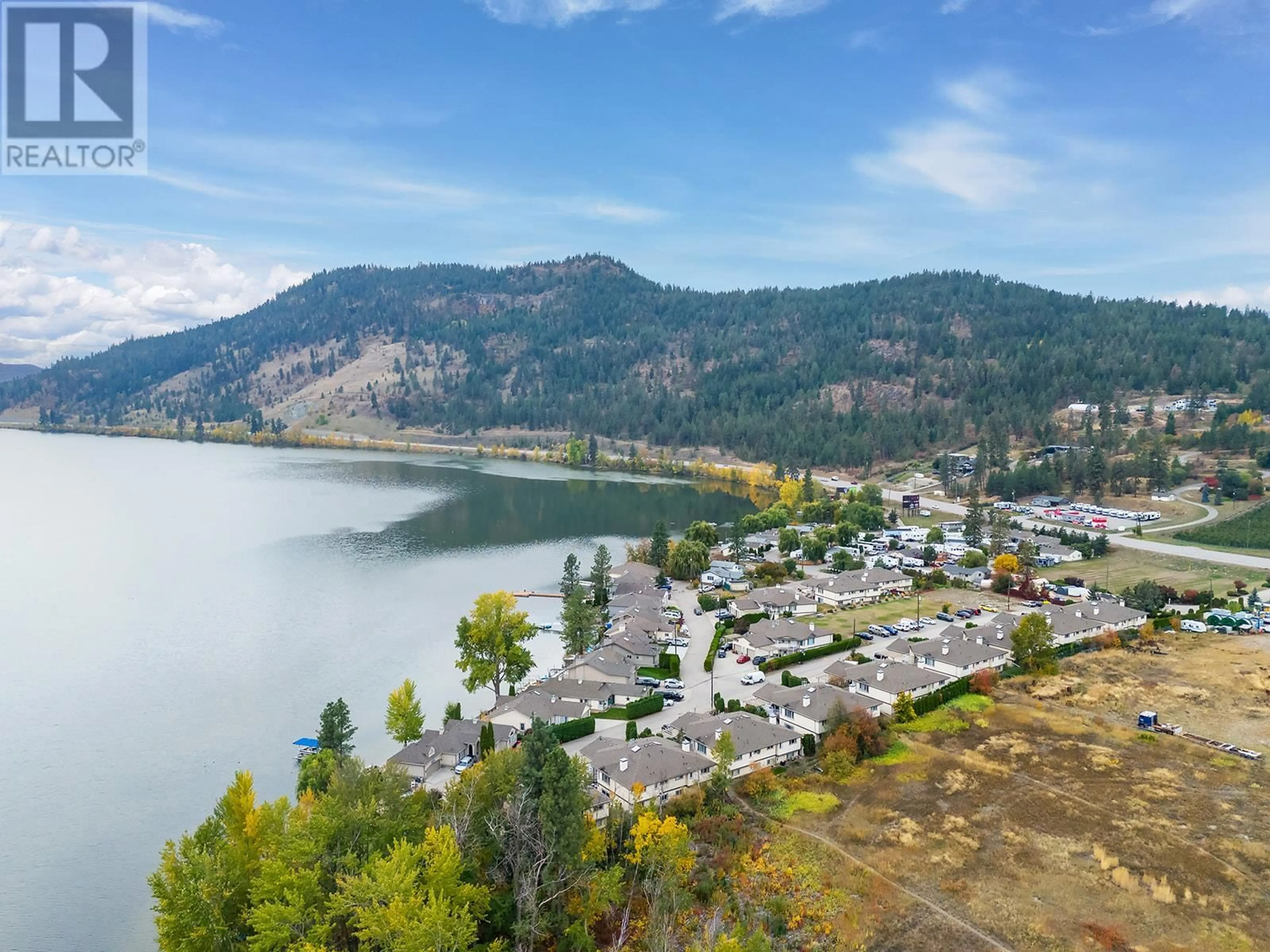 A pic from outside/outdoor area/front of a property/back of a property/a pic from drone, water/lake/river/ocean view for 107-3 - 7841 97 HIGHWAY, Lake Country British Columbia V4V1E7