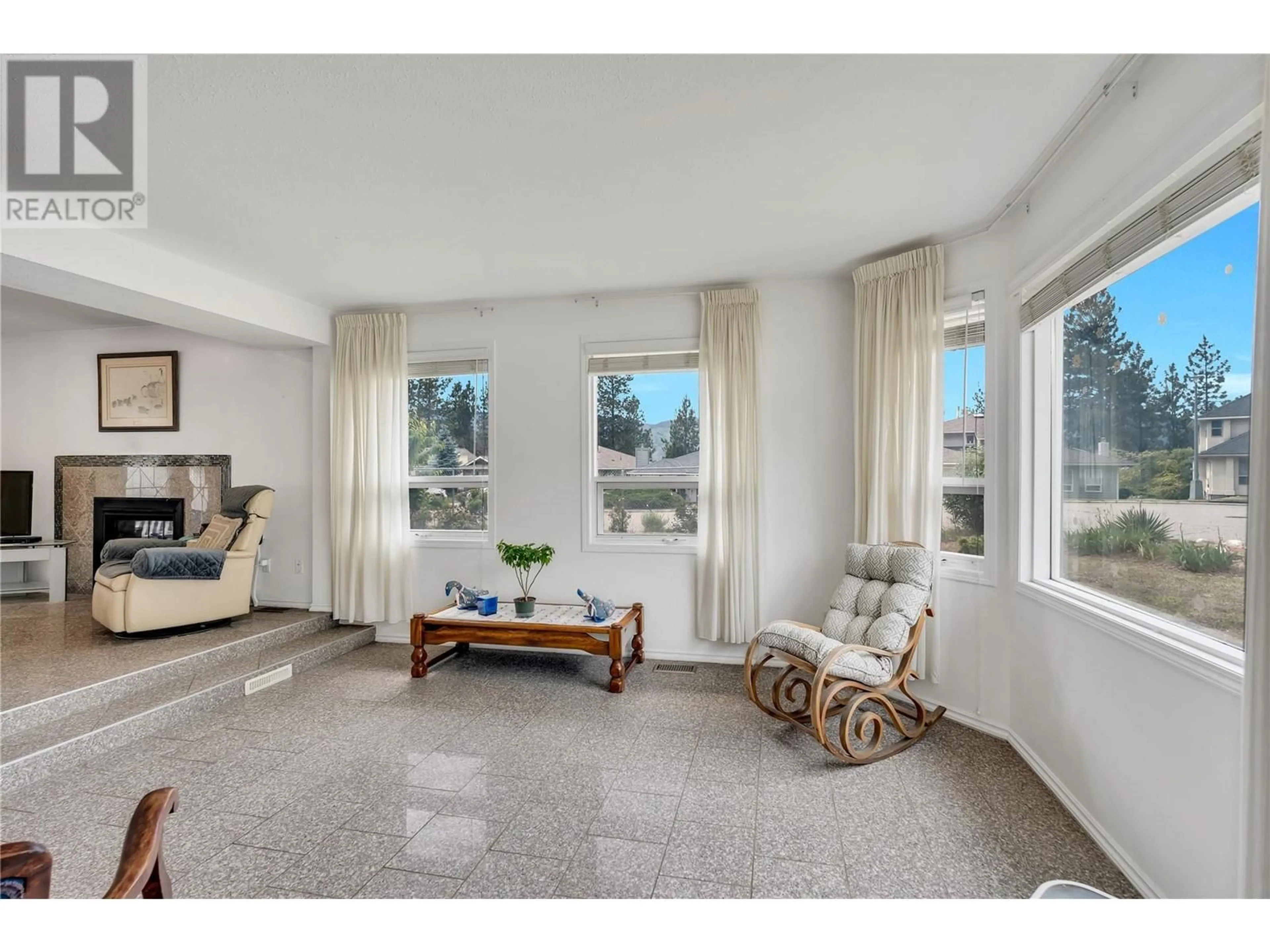 Living room with furniture, ceramic/tile floor for 123 EVERGREEN CRESCENT, Penticton British Columbia V2A8C5