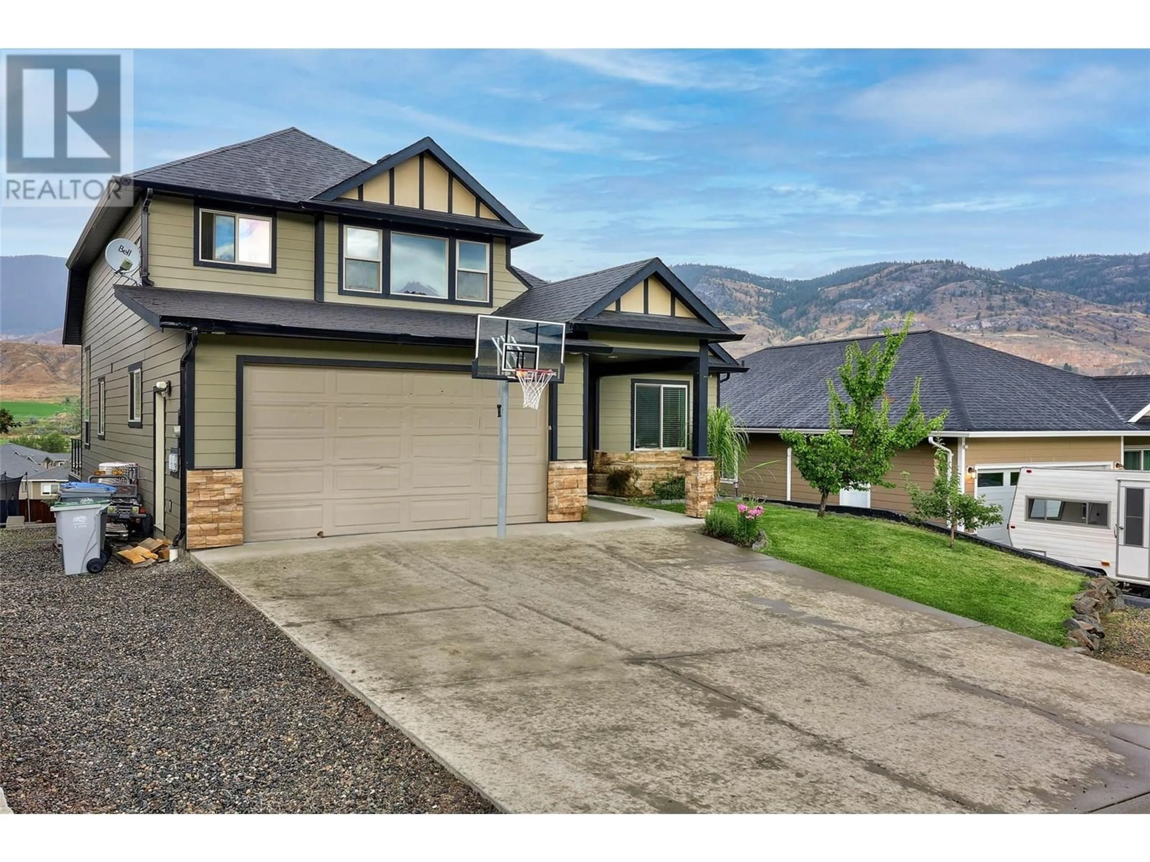 Home with vinyl exterior material, mountain view for 8774 BADGER DRIVE, Kamloops British Columbia V2C0B2