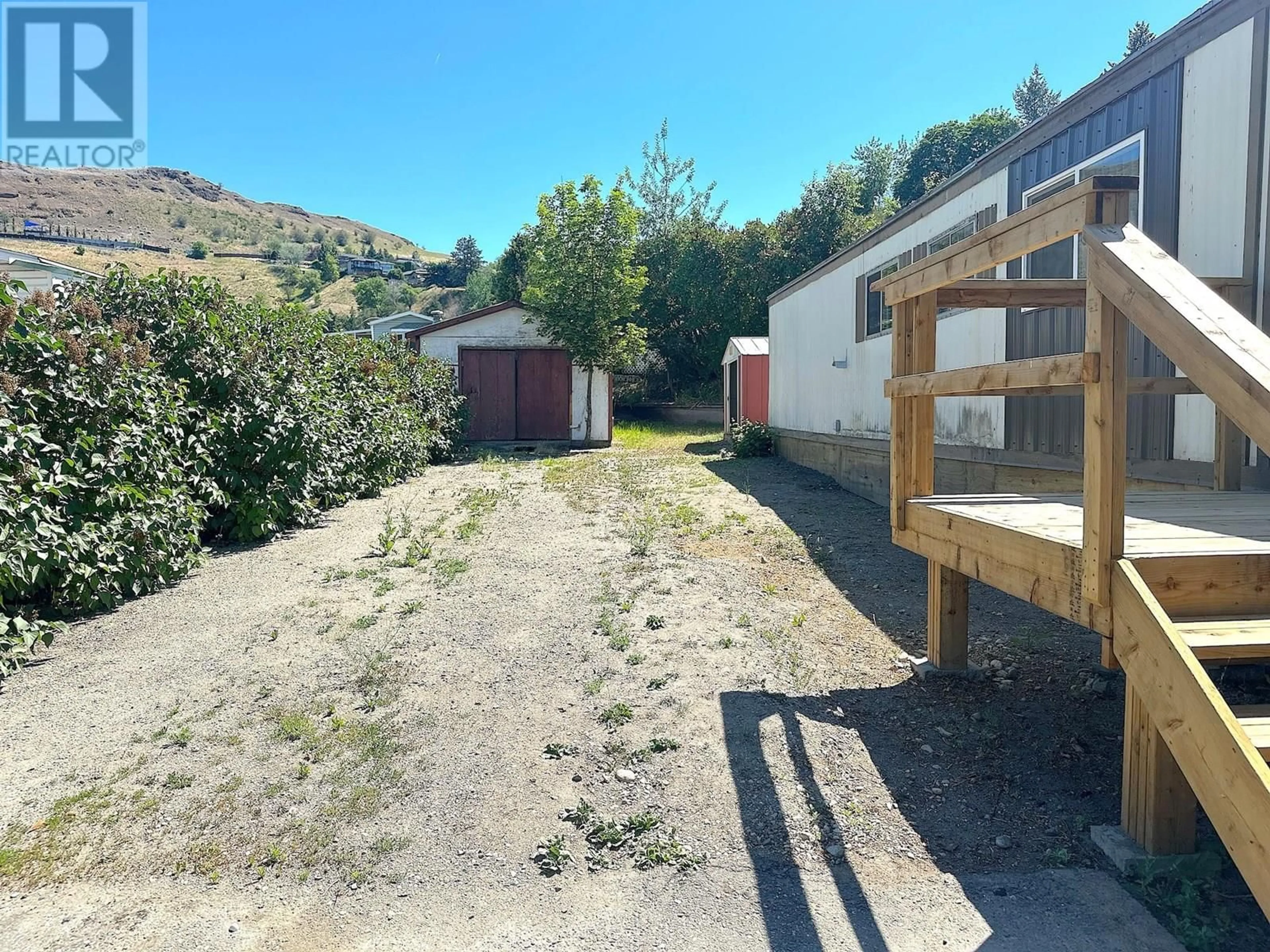 A pic from outside/outdoor area/front of a property/back of a property/a pic from drone, unknown for 160 - 15401 KALAMALKA ROAD, Coldstream British Columbia V1B1Z3
