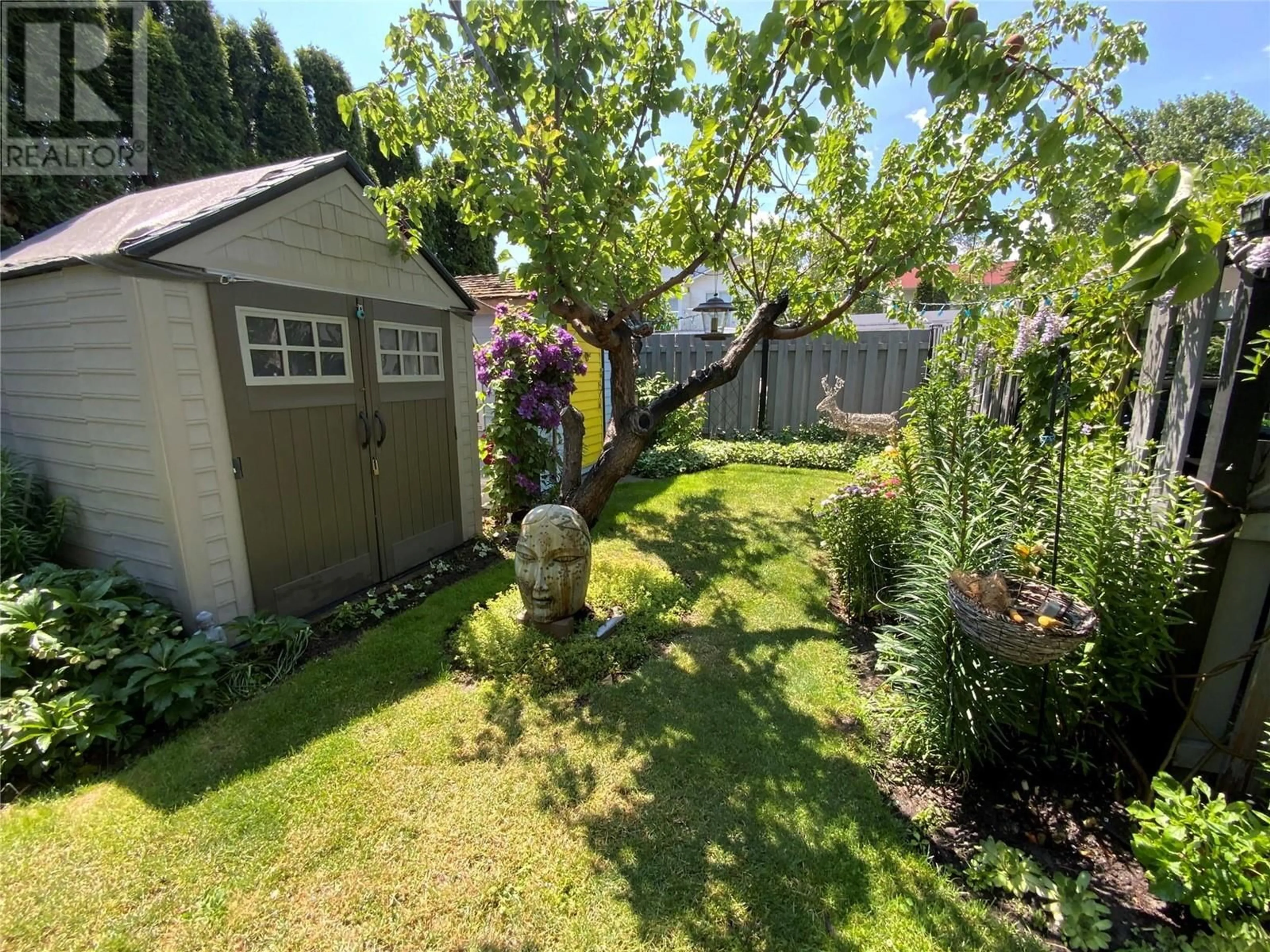 A pic from outside/outdoor area/front of a property/back of a property/a pic from drone, street for 207 MAPLE STREET, Penticton British Columbia V2A5V6