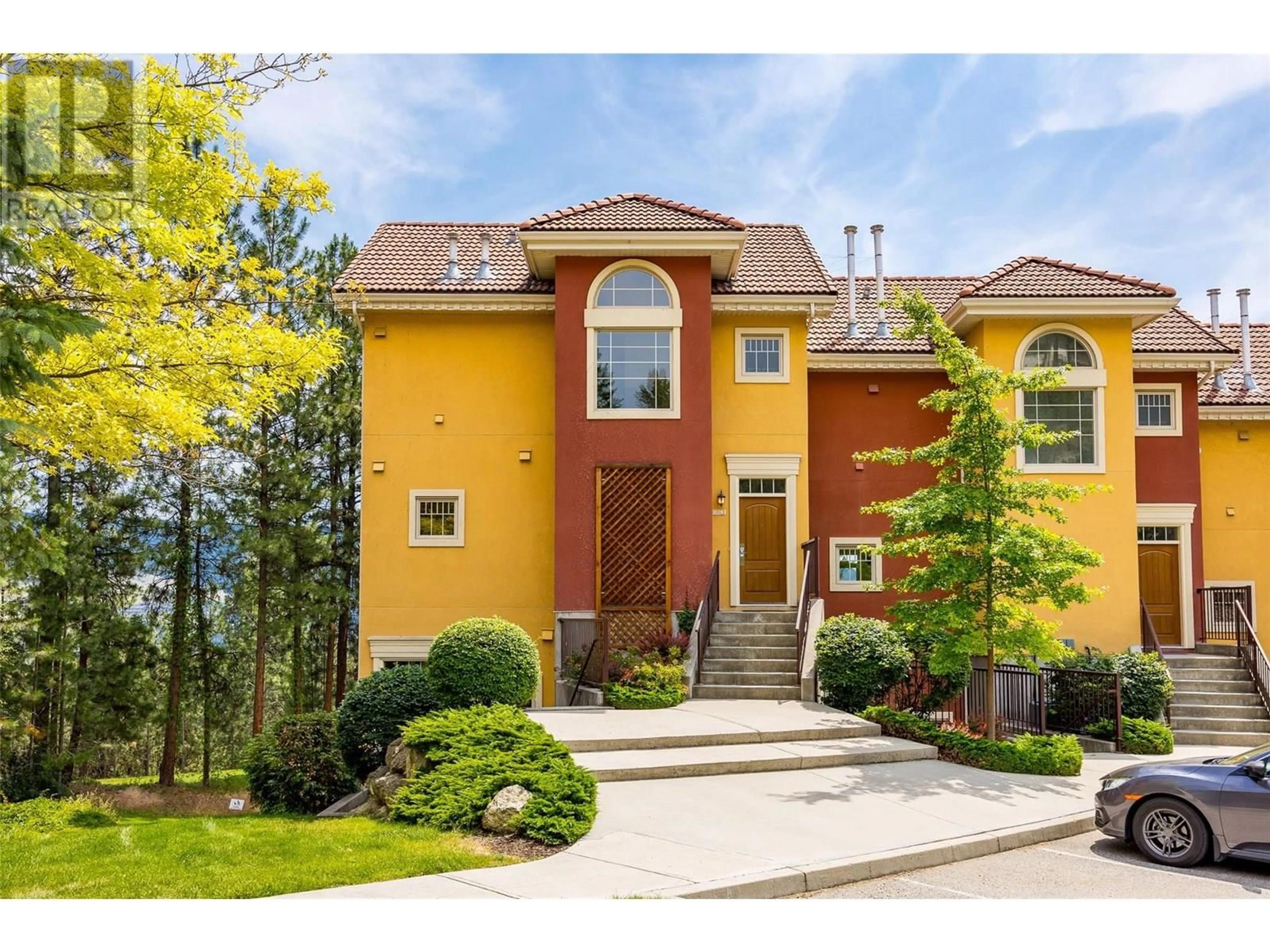 Home with brick exterior material, street for 203 - 1795 COUNTRY CLUB DRIVE, Kelowna British Columbia V1V1V9