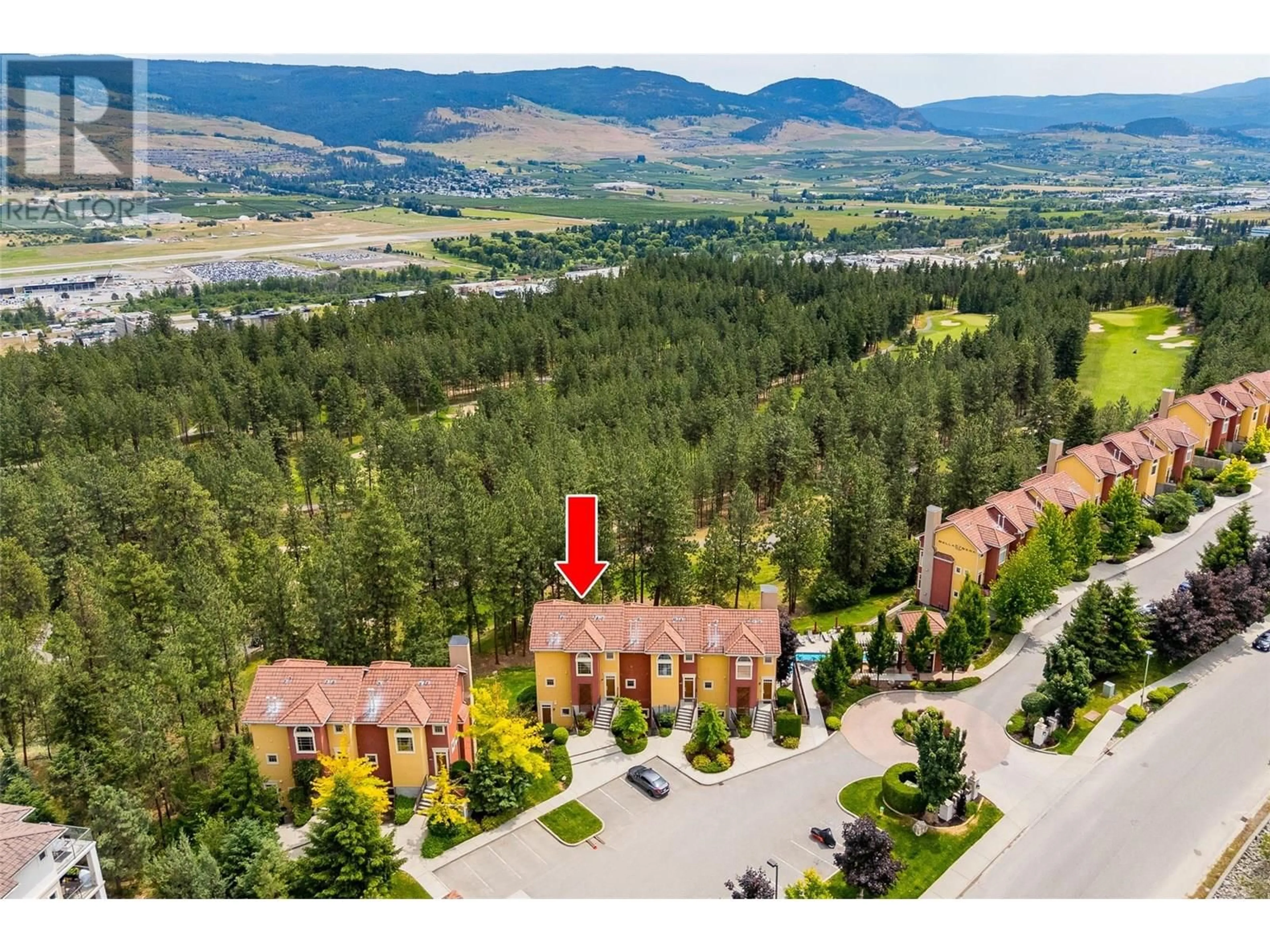 A pic from outside/outdoor area/front of a property/back of a property/a pic from drone, mountain view for 203 - 1795 COUNTRY CLUB DRIVE, Kelowna British Columbia V1V1V9