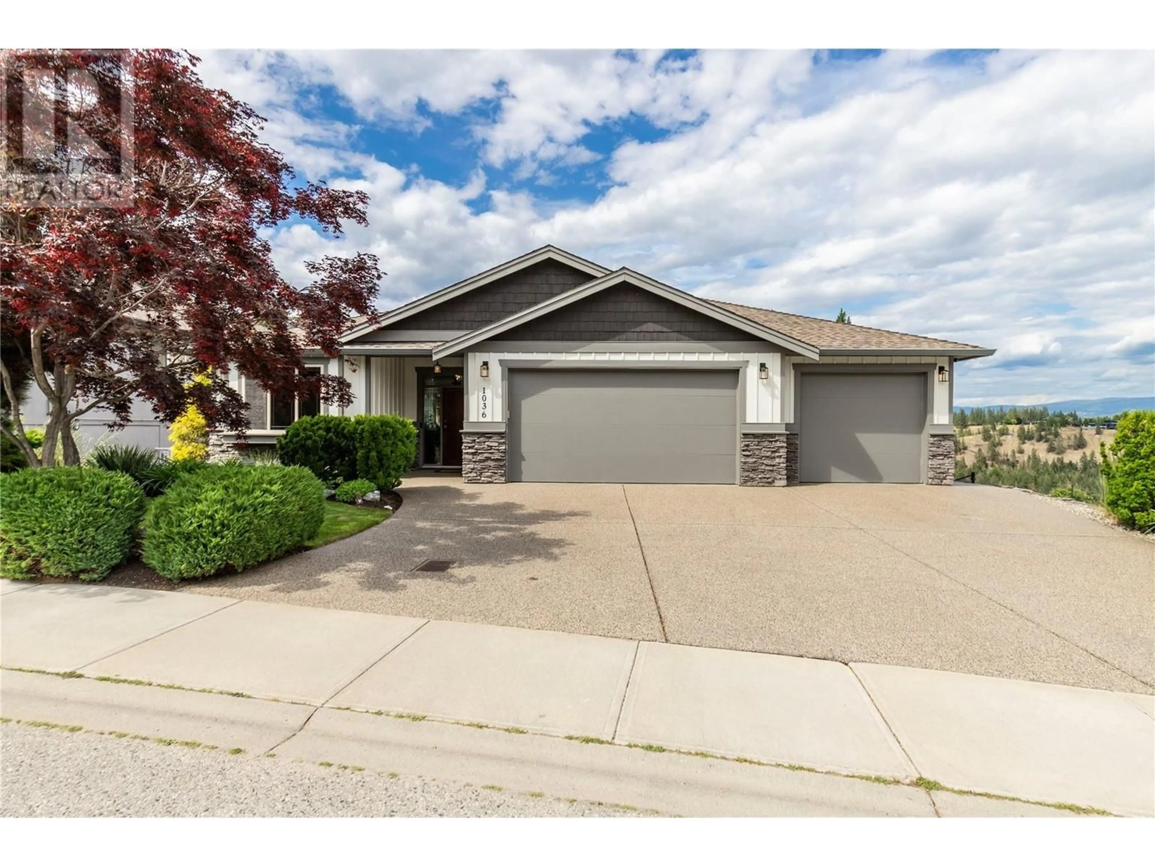 Home with vinyl exterior material, street for 1036 ARBOR VIEW DRIVE, Kelowna British Columbia V1W5A1
