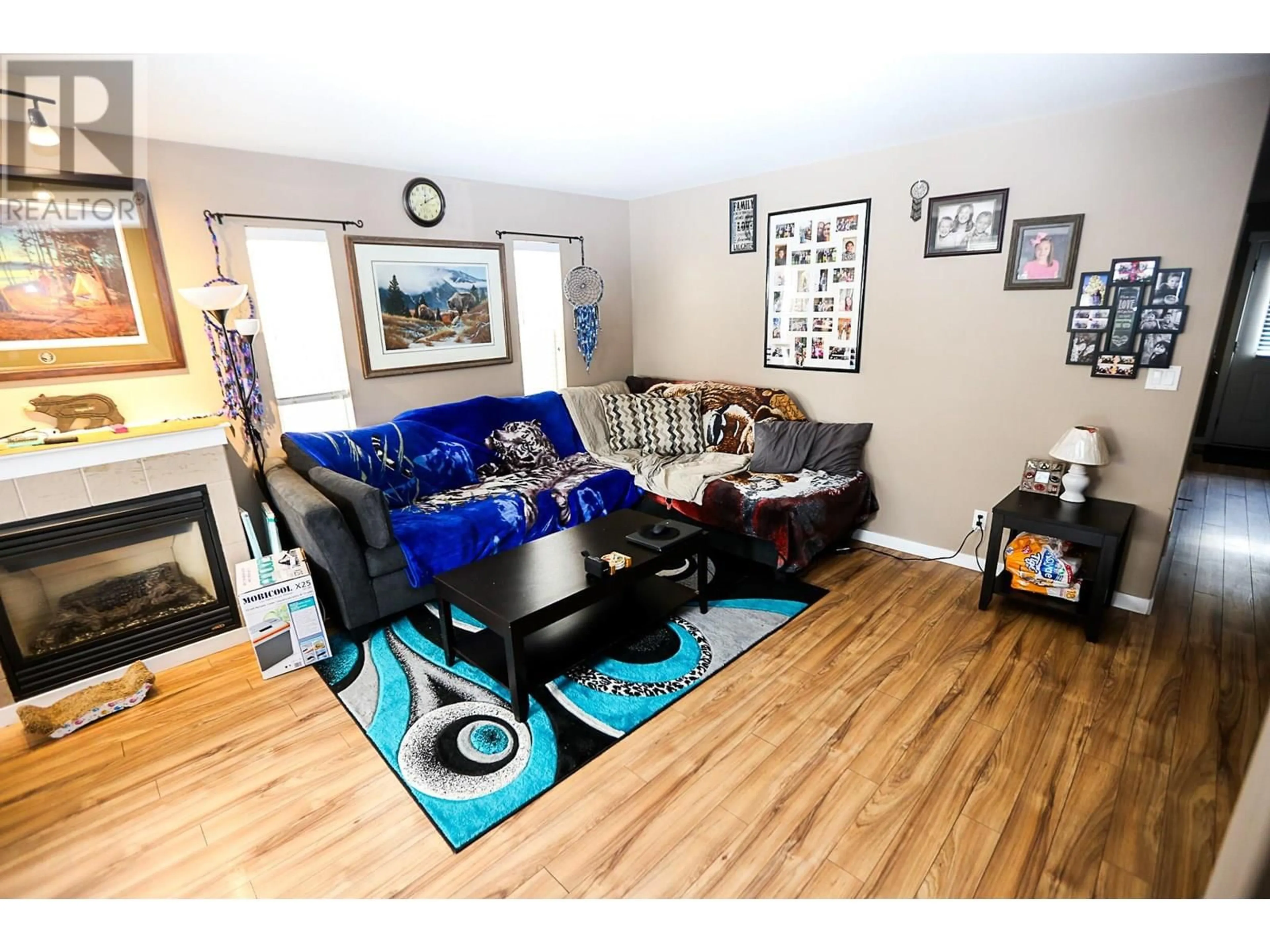 Living room with furniture, wood/laminate floor for 17 - 930 STAGECOACH DRIVE, Kamloops British Columbia V2B0A9