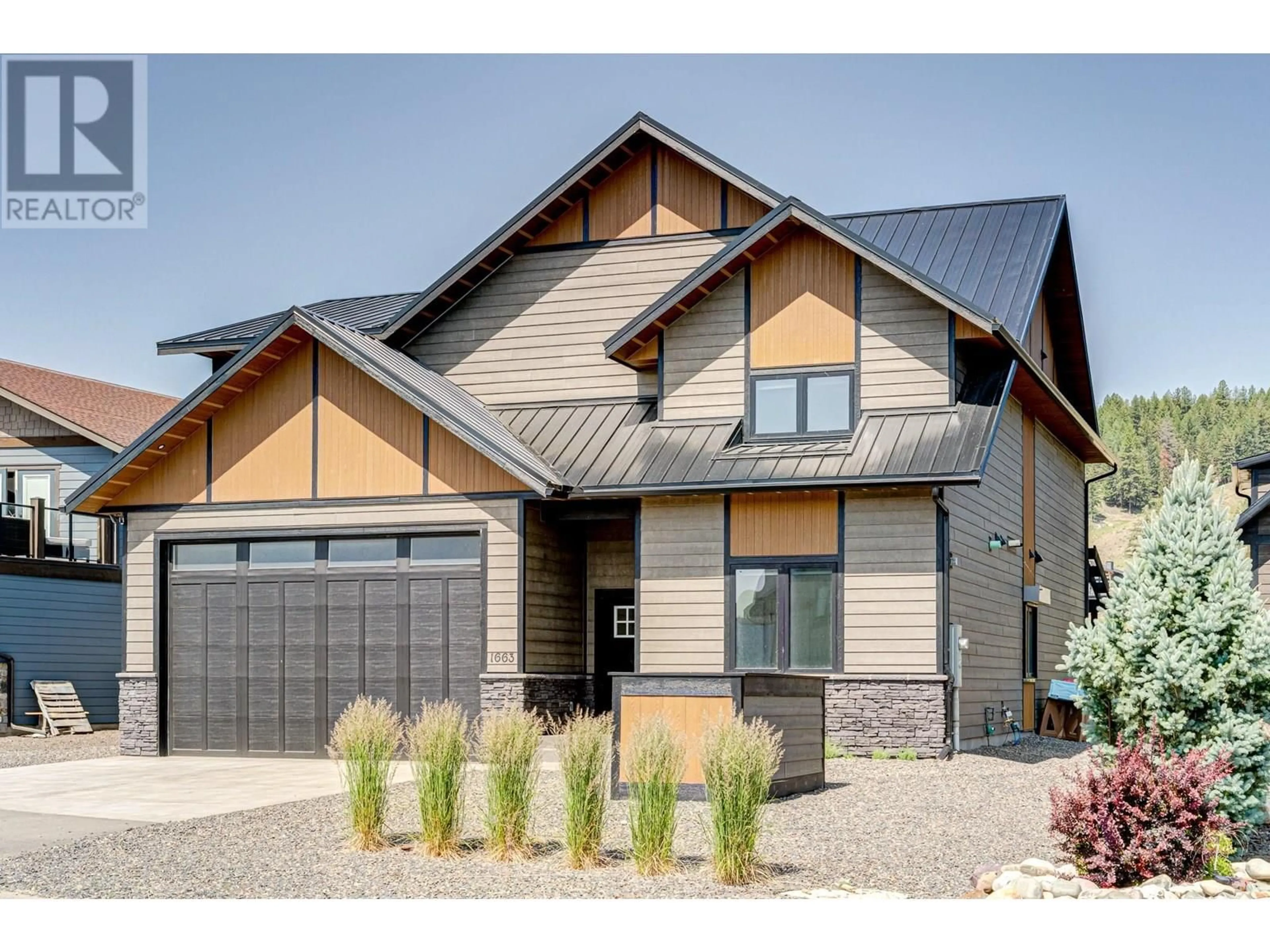 Home with brick exterior material, street for 1663 KOOCANUSA LAKE DRIVE, Lake Koocanusa British Columbia V0B1T5