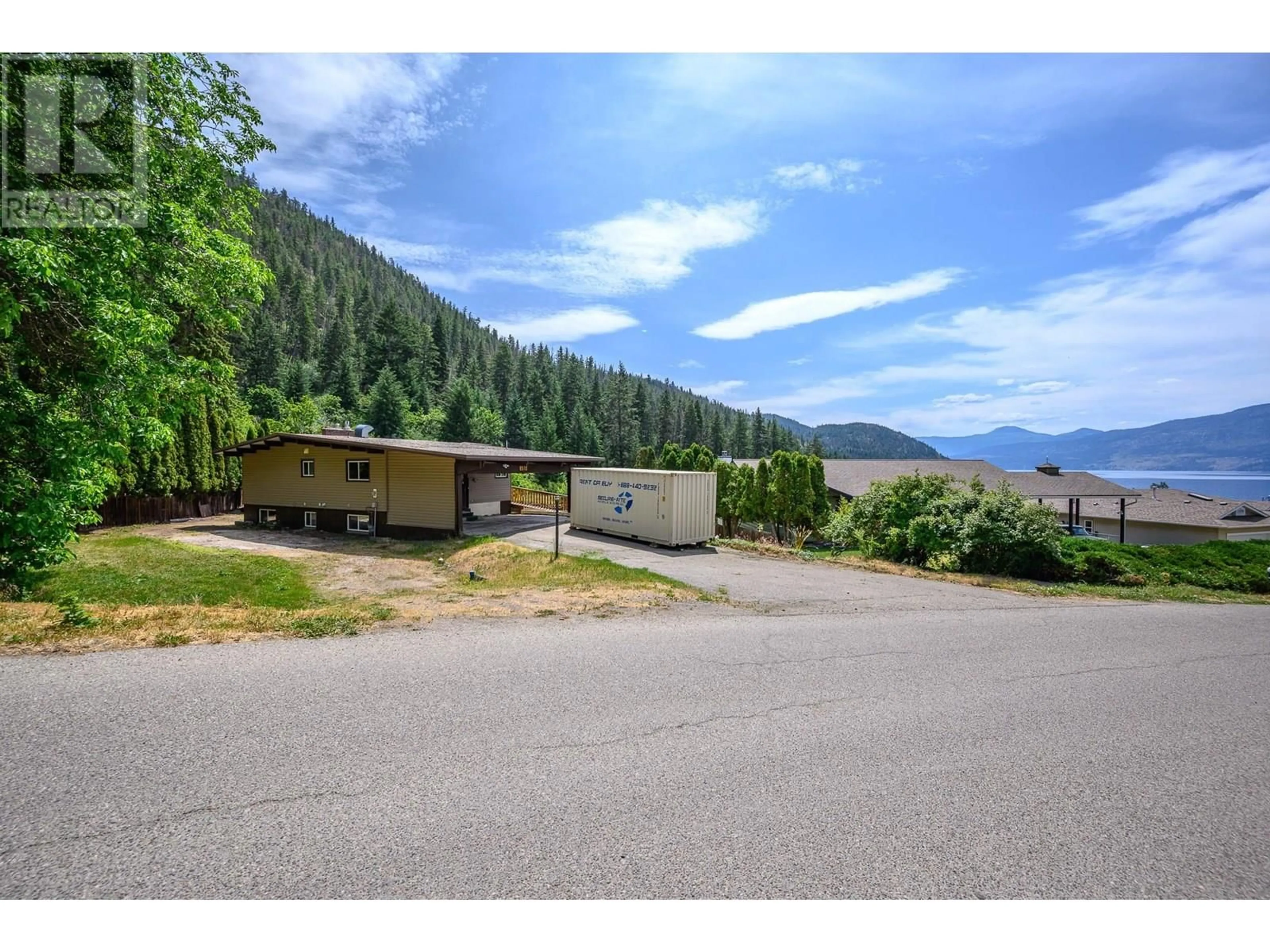 A pic from outside/outdoor area/front of a property/back of a property/a pic from drone, mountain view for 8570 HARBOUR HEIGHTS ROAD, Vernon British Columbia V1H1J8