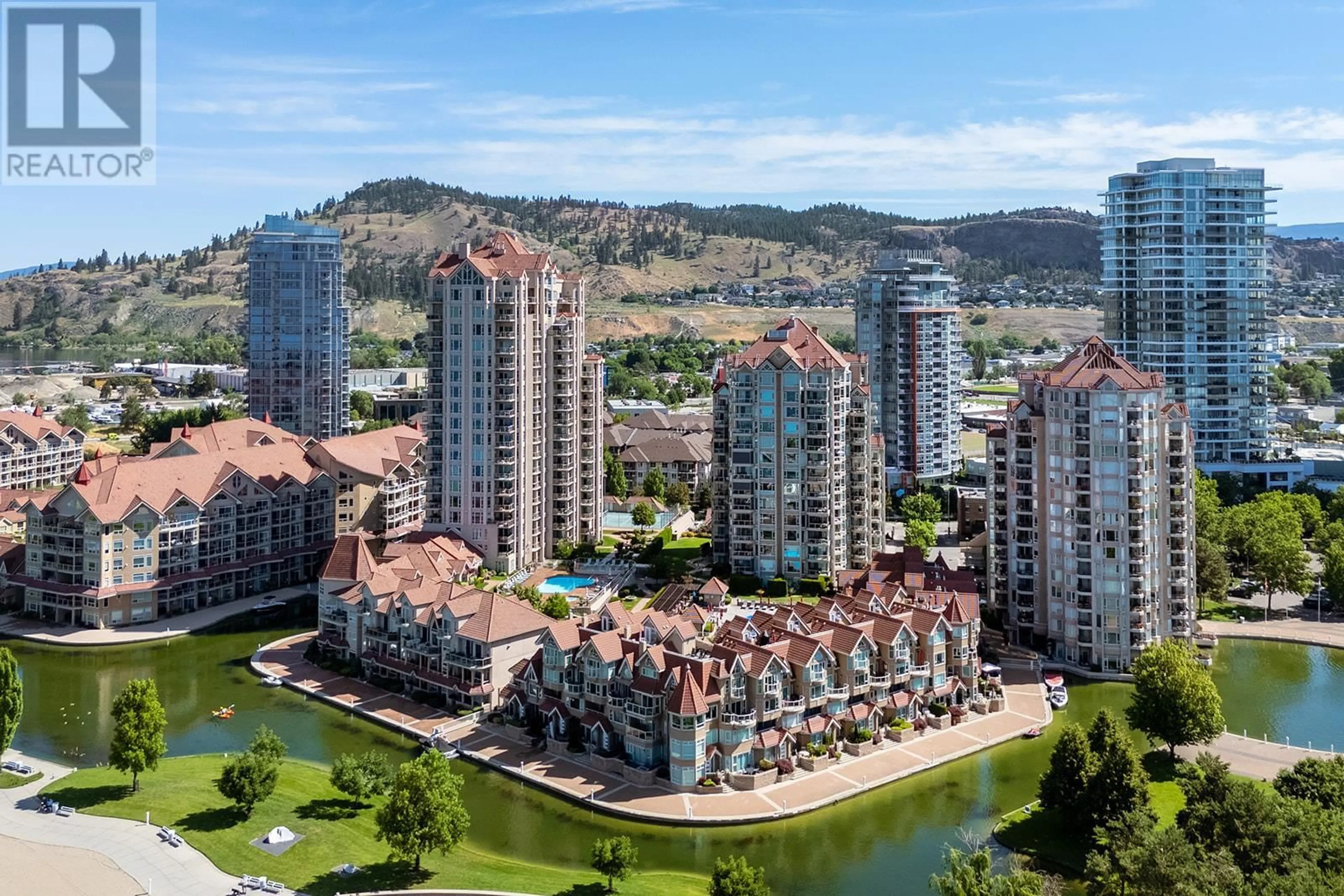 A pic from outside/outdoor area/front of a property/back of a property/a pic from drone, city buildings view from balcony for 703 - 1128 SUNSET DRIVE, Kelowna British Columbia V1Y9W7