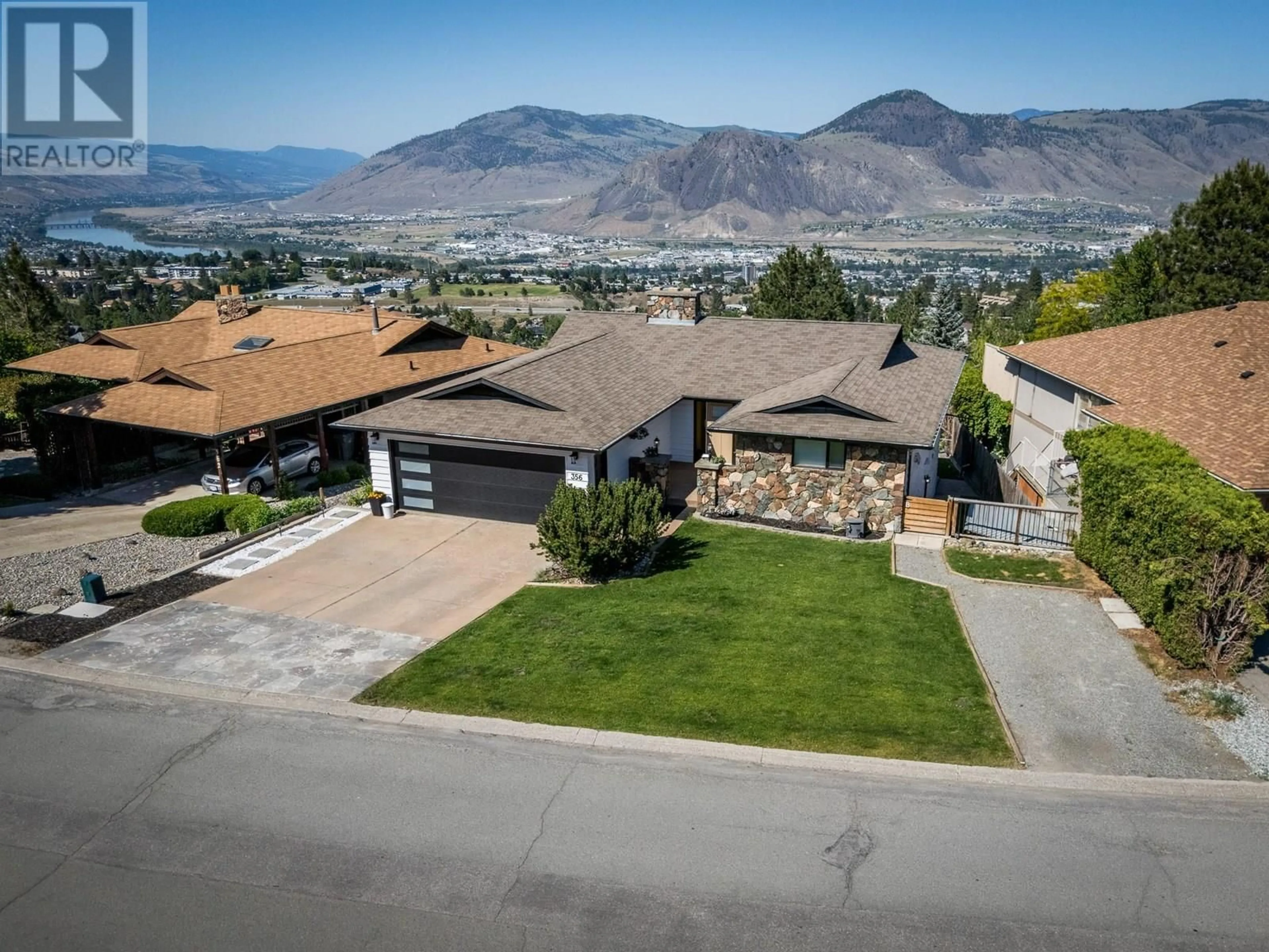 A pic from outside/outdoor area/front of a property/back of a property/a pic from drone, mountain view for 356 GLENEAGLES DRIVE, Kamloops British Columbia V2E1Z4