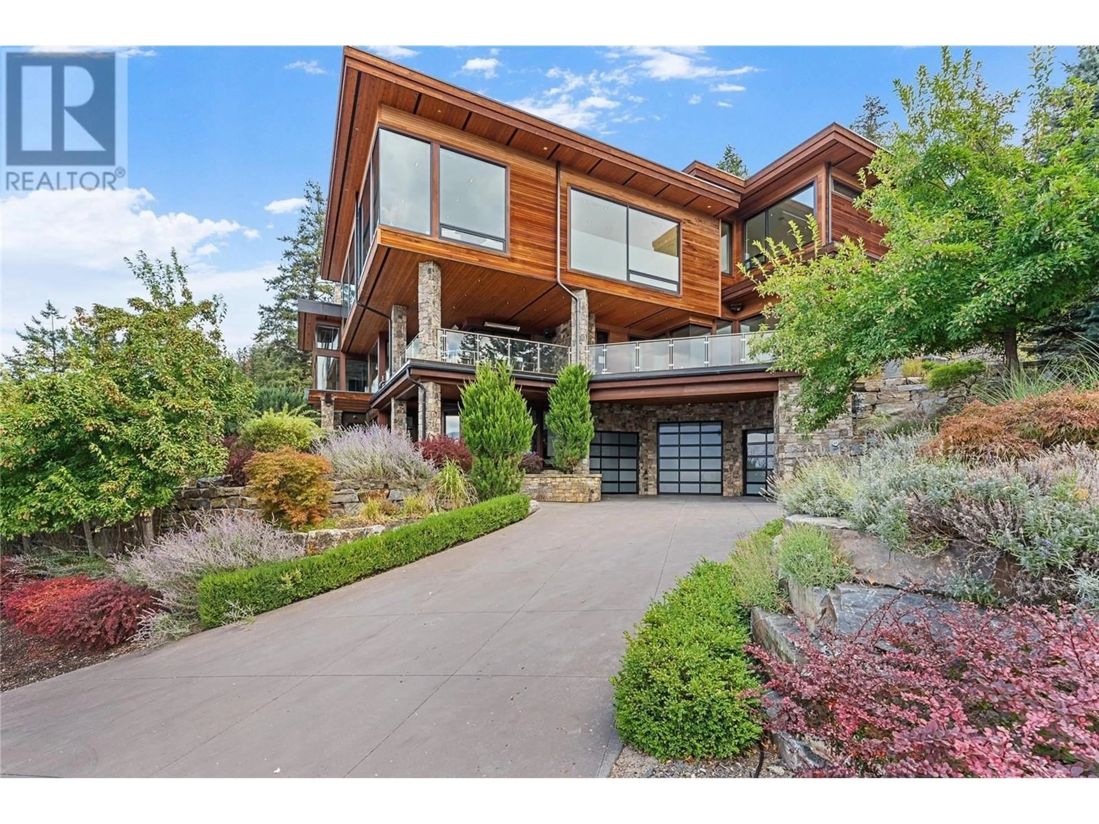 Home with brick exterior material, street for 23 - 180 SHEERWATER COURT, Kelowna British Columbia V1V2X1