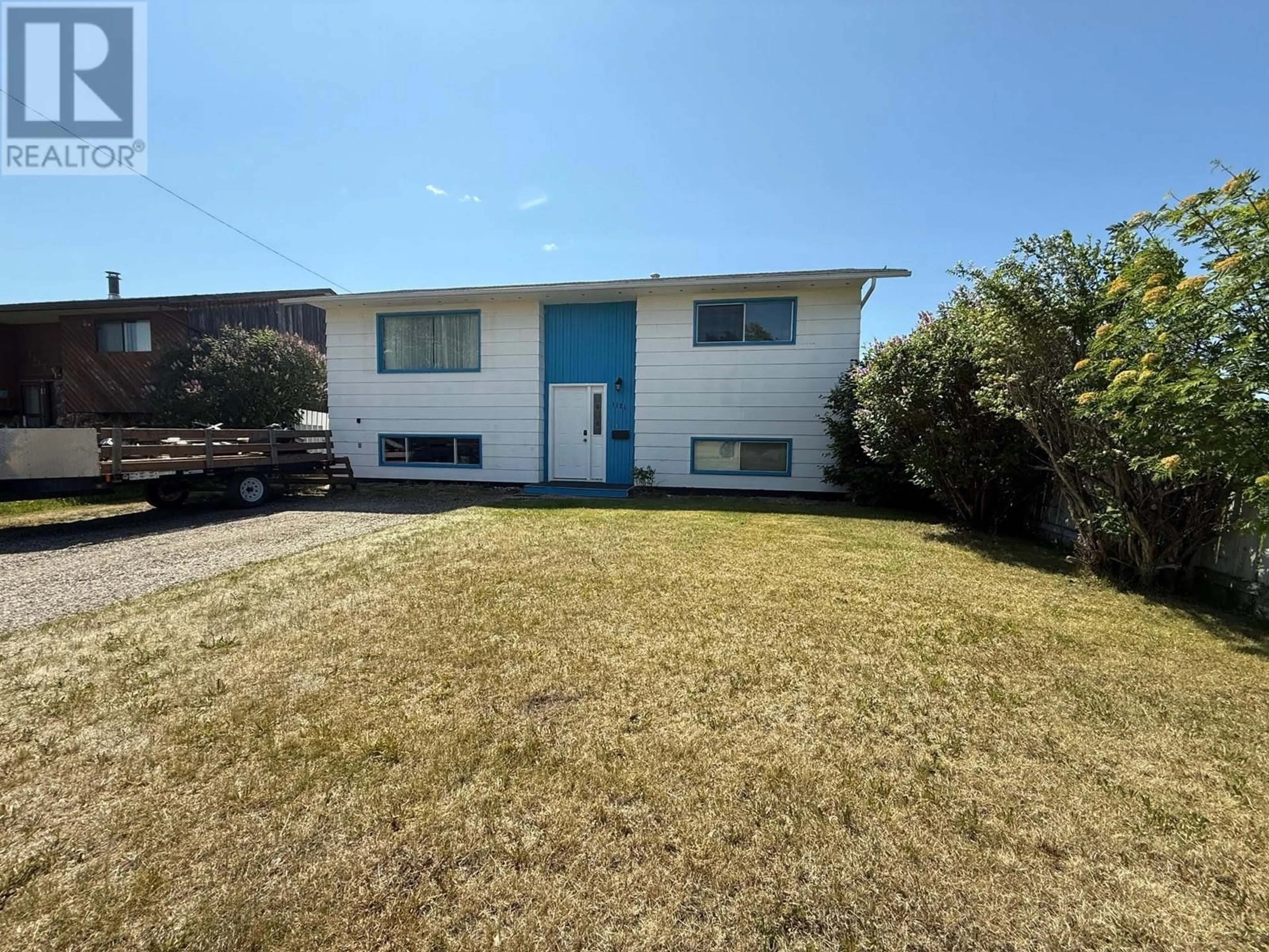 A pic from outside/outdoor area/front of a property/back of a property/a pic from drone, unknown for 1121 121 AVENUE, Dawson Creek British Columbia V1G3K7