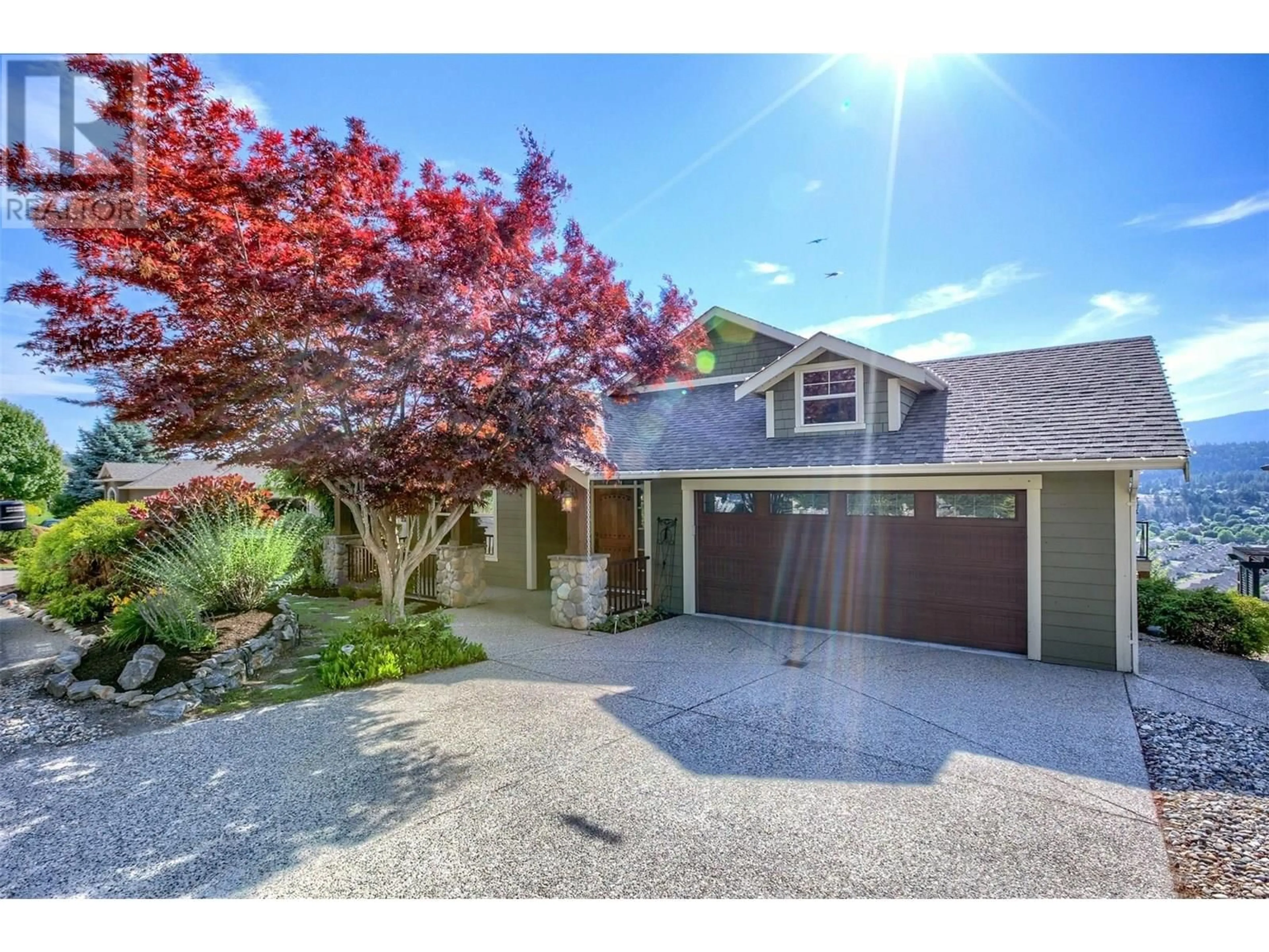 Home with vinyl exterior material, street for 628 DENALI DRIVE, Kelowna British Columbia V1V2P5