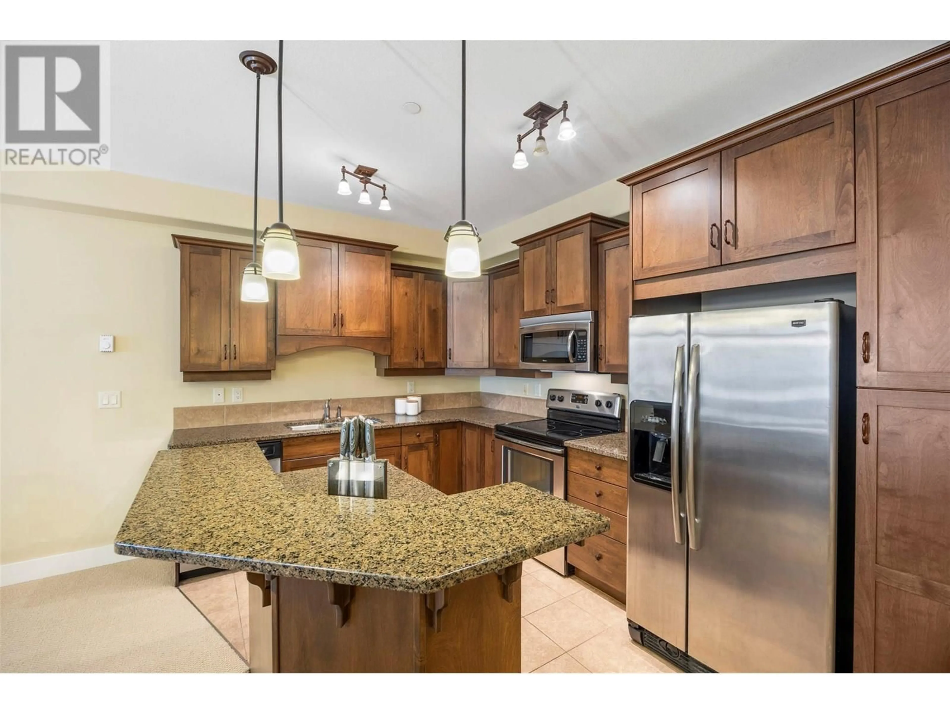 Open concept kitchen, ceramic/tile floor for 305 - 775 MCGILL ROAD, Kamloops British Columbia V2C0B8