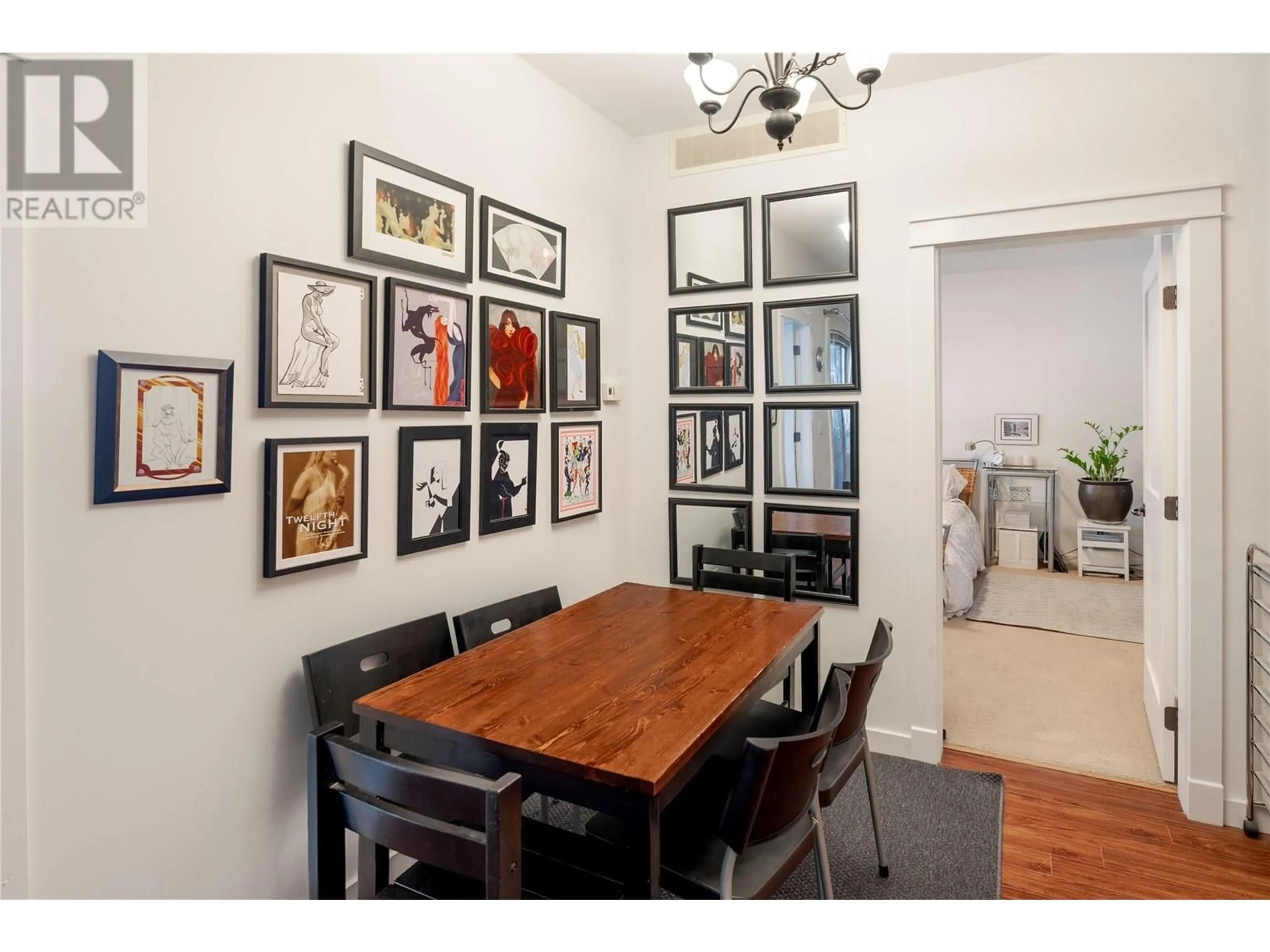 Dining room, wood/laminate floor for 101 - 511 YATES ROAD, Kelowna British Columbia V1V2X2