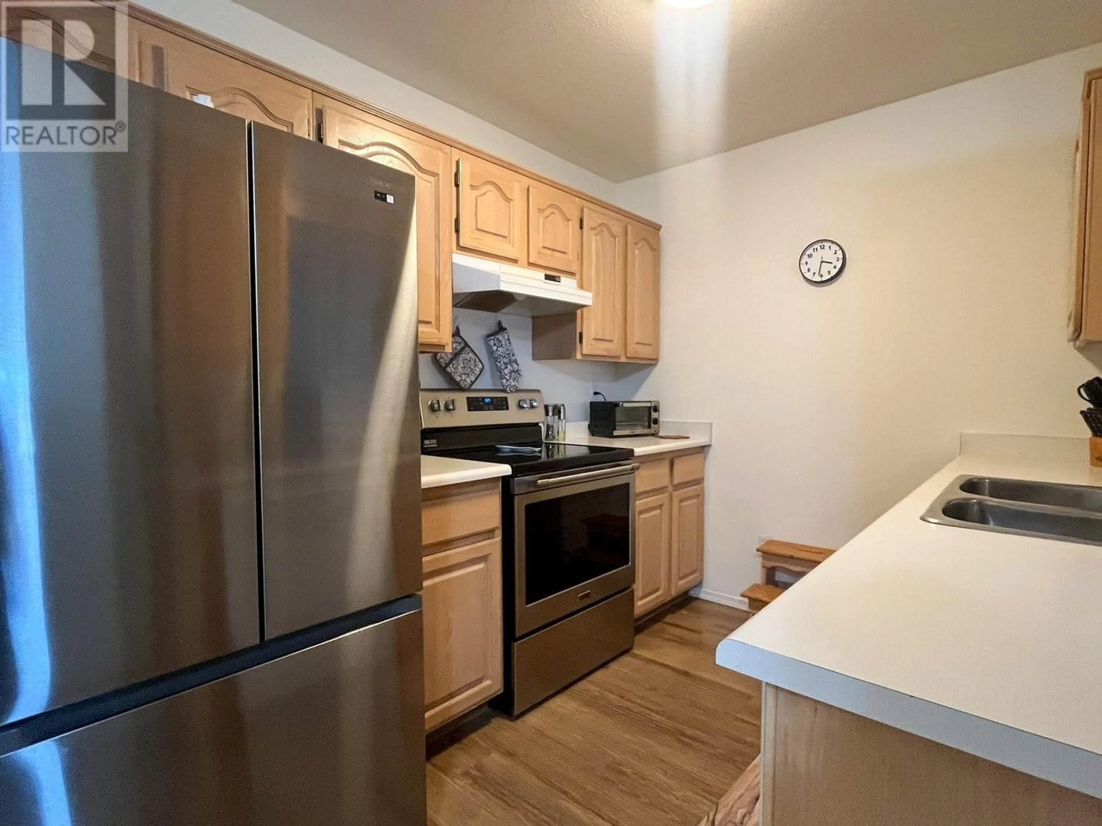 Standard kitchen, wood/laminate floor for 214 - 1329 KLO ROAD, Kelowna British Columbia V1W3N9