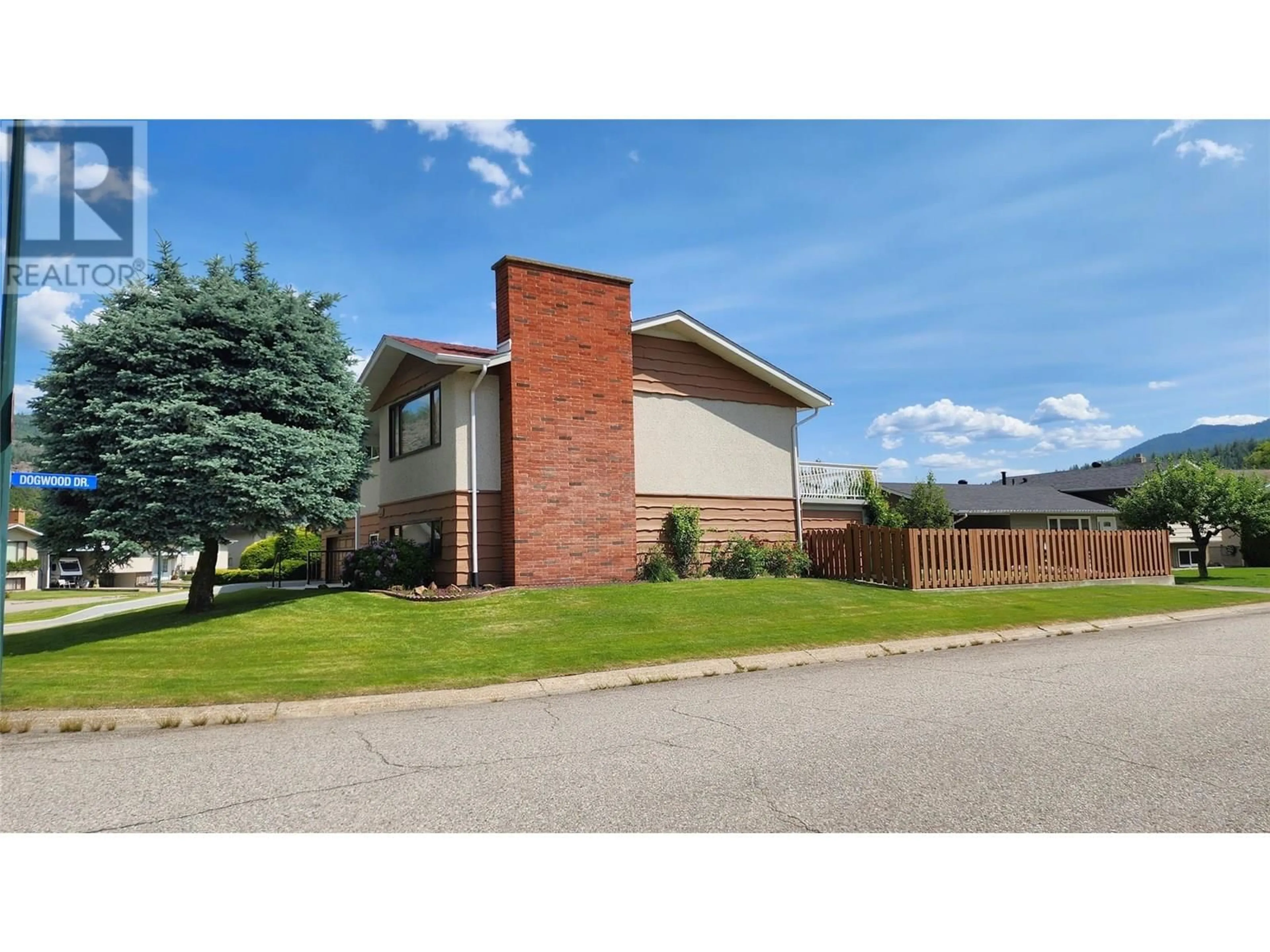 Home with brick exterior material, street for 3900 WOODLAND DRIVE, Trail British Columbia V1R2V8