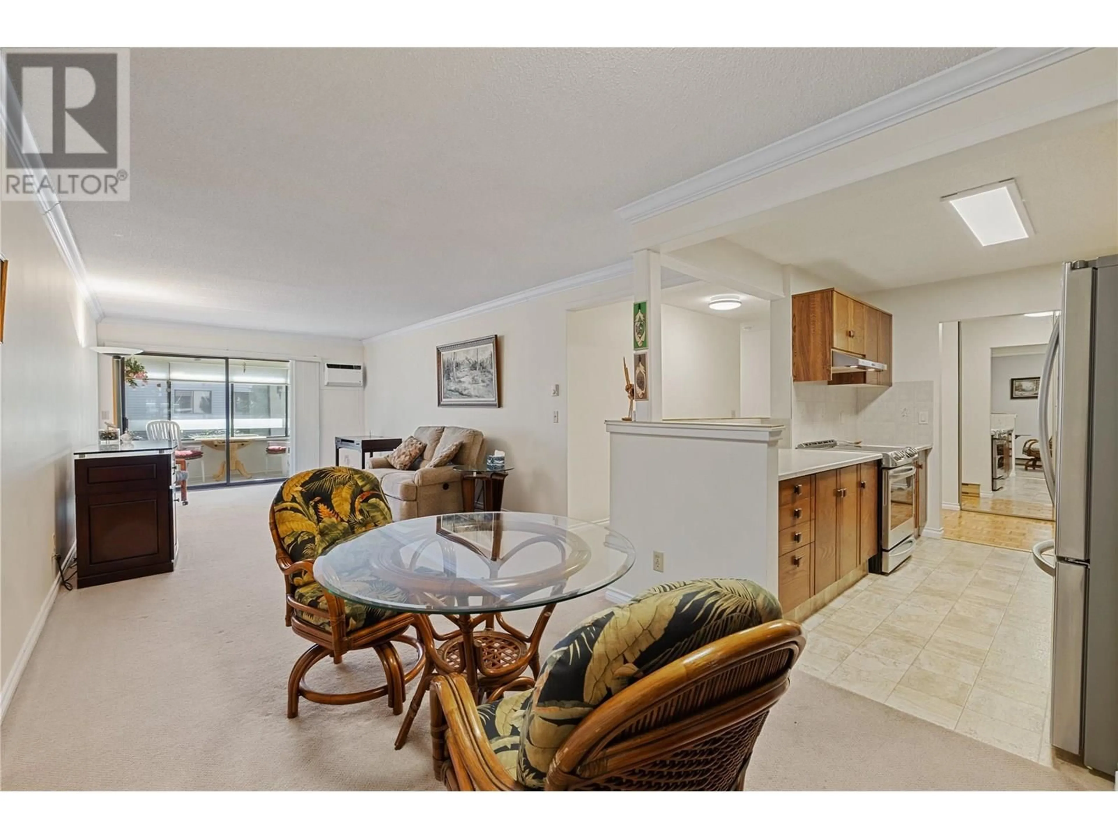 Living room with furniture, unknown for 104 - 1035 BERNARD AVENUE, Kelowna British Columbia V1Y6P7