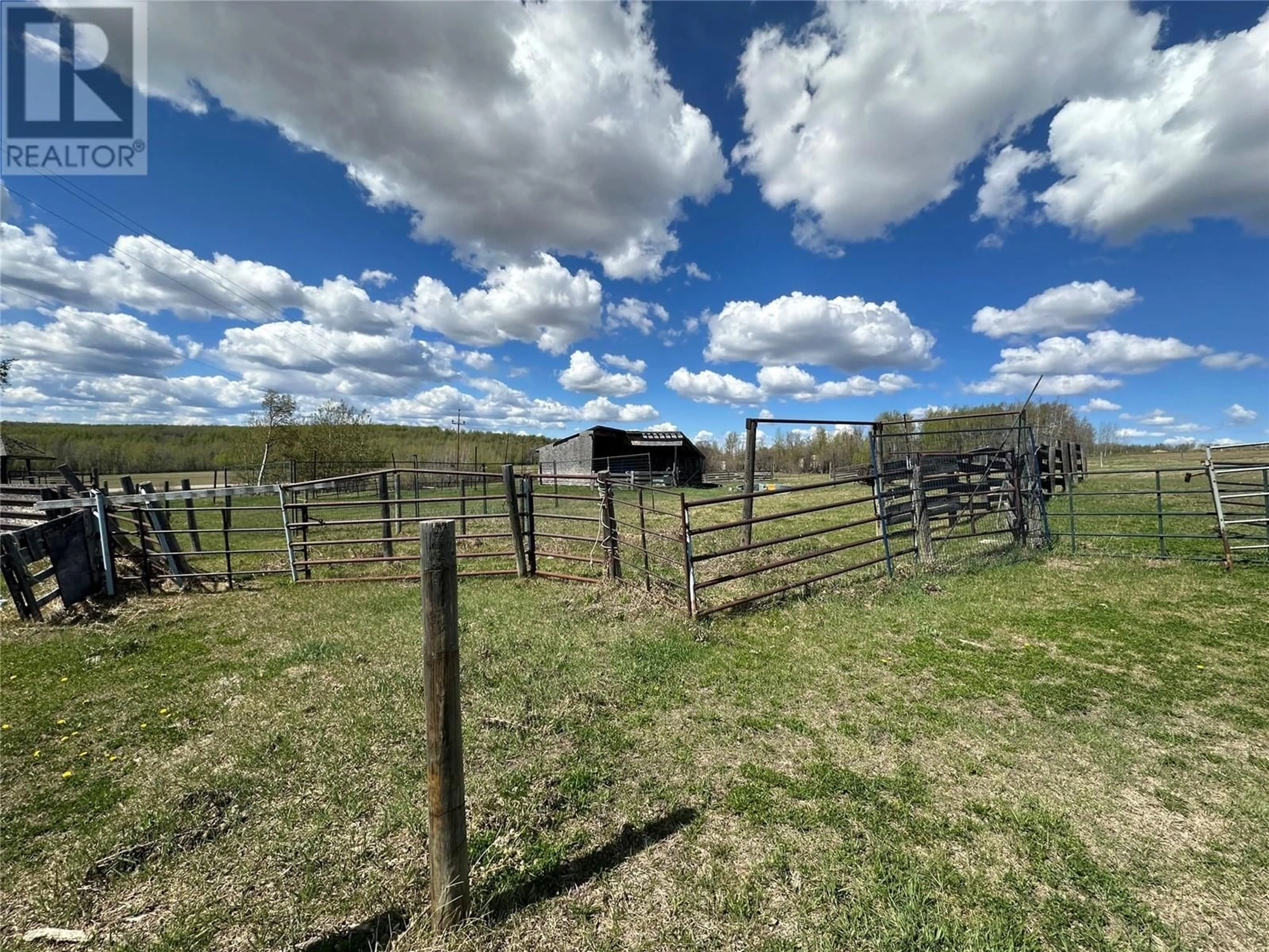 A pic from outside/outdoor area/front of a property/back of a property/a pic from drone, mountain view for 5420 224 ROAD, Dawson Creek British Columbia V1G0J4