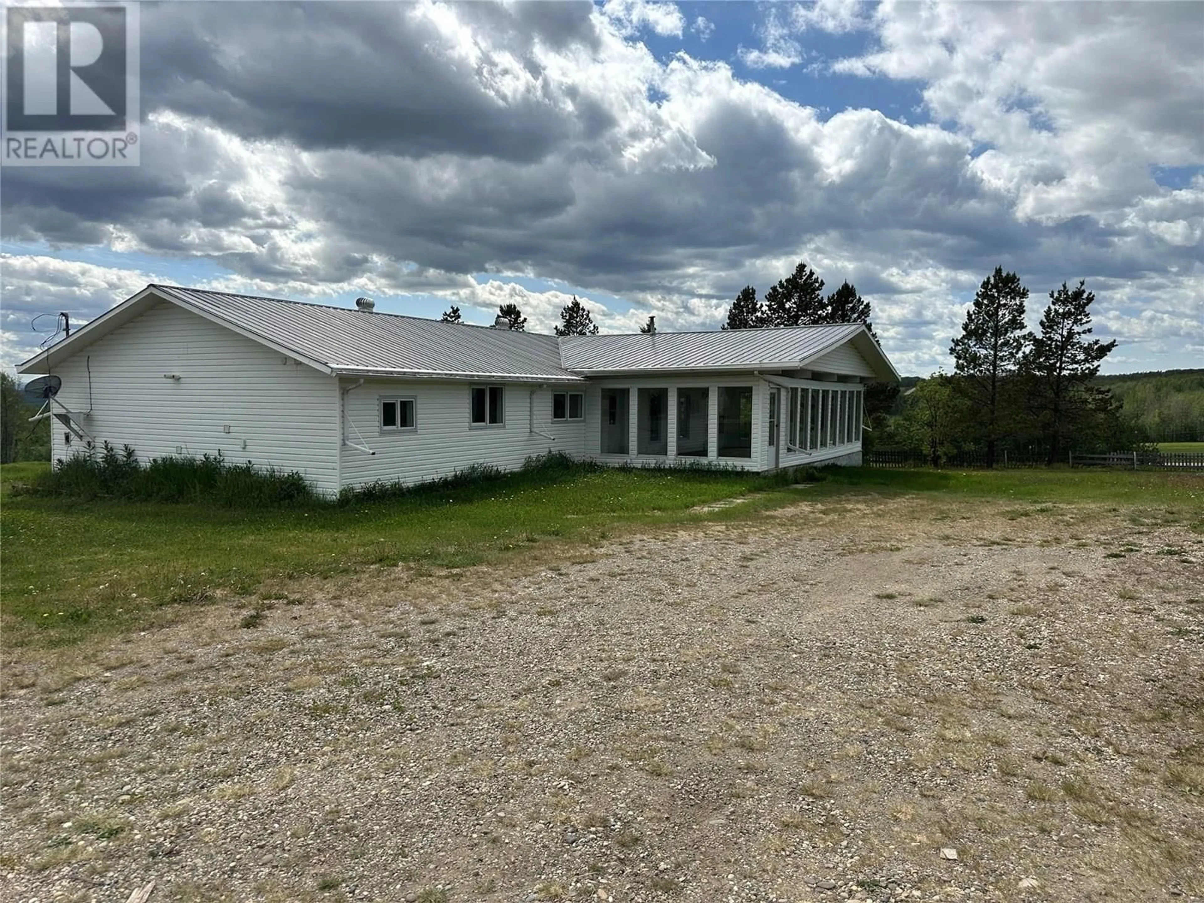 A pic from outside/outdoor area/front of a property/back of a property/a pic from drone, building for 5420 224 ROAD, Dawson Creek British Columbia V1G0J4