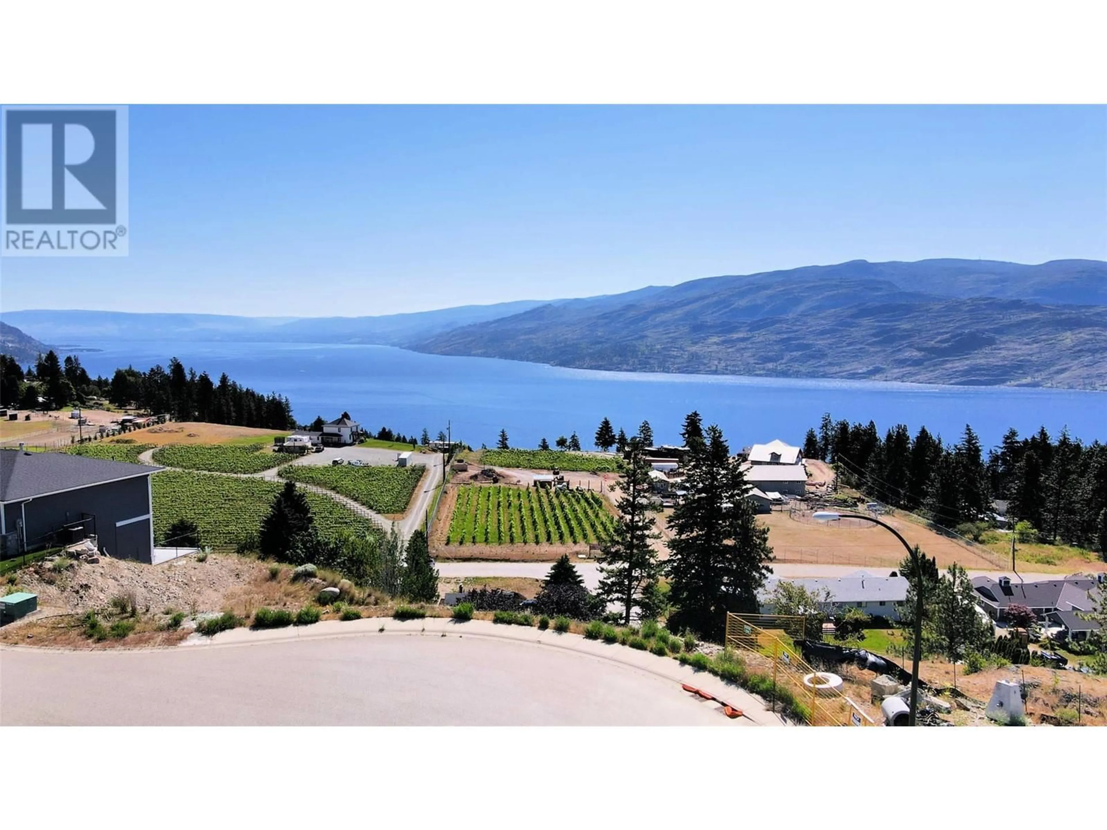 A pic from outside/outdoor area/front of a property/back of a property/a pic from drone, water/lake/river/ocean view for 6018 FULKS ROAD, Peachland British Columbia V0H1X4