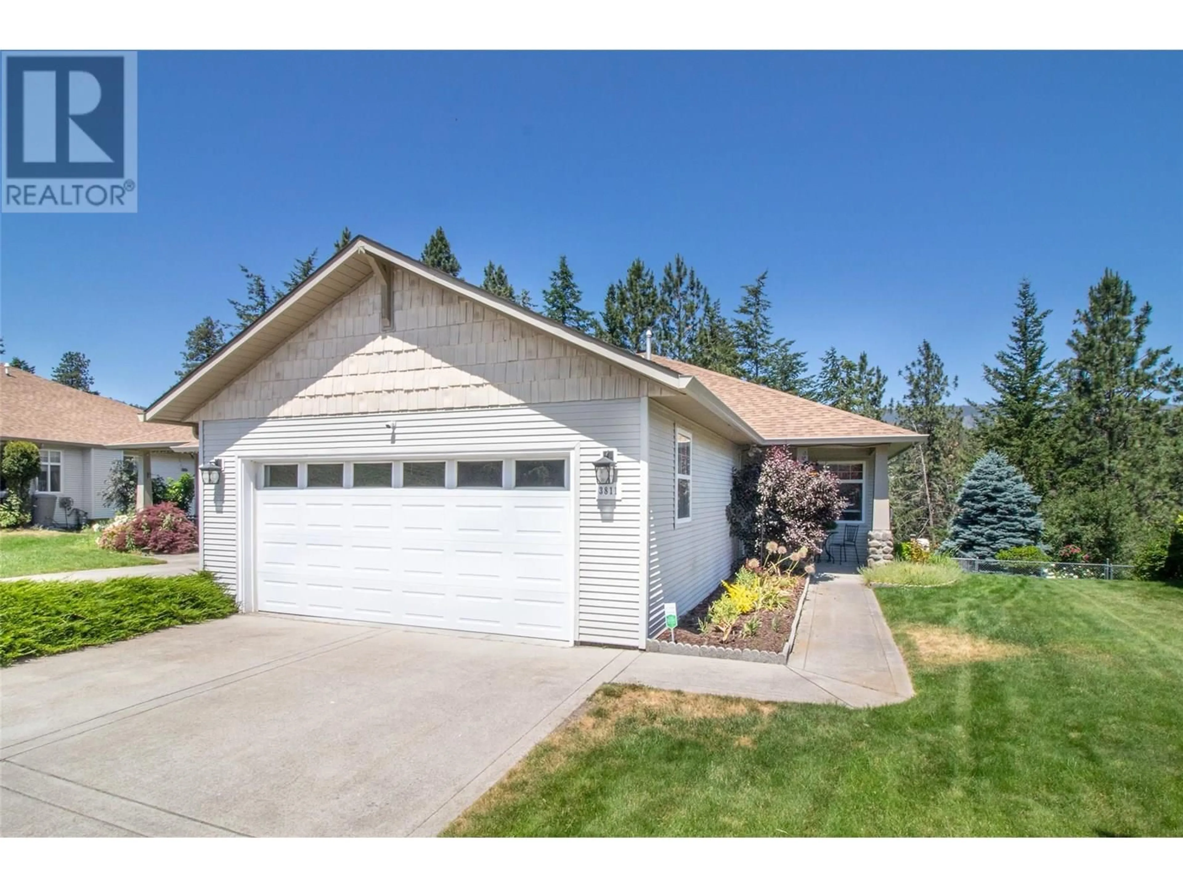 Home with vinyl exterior material, street for 3811 GLEN CANYON DRIVE, West Kelowna British Columbia V4T2P7