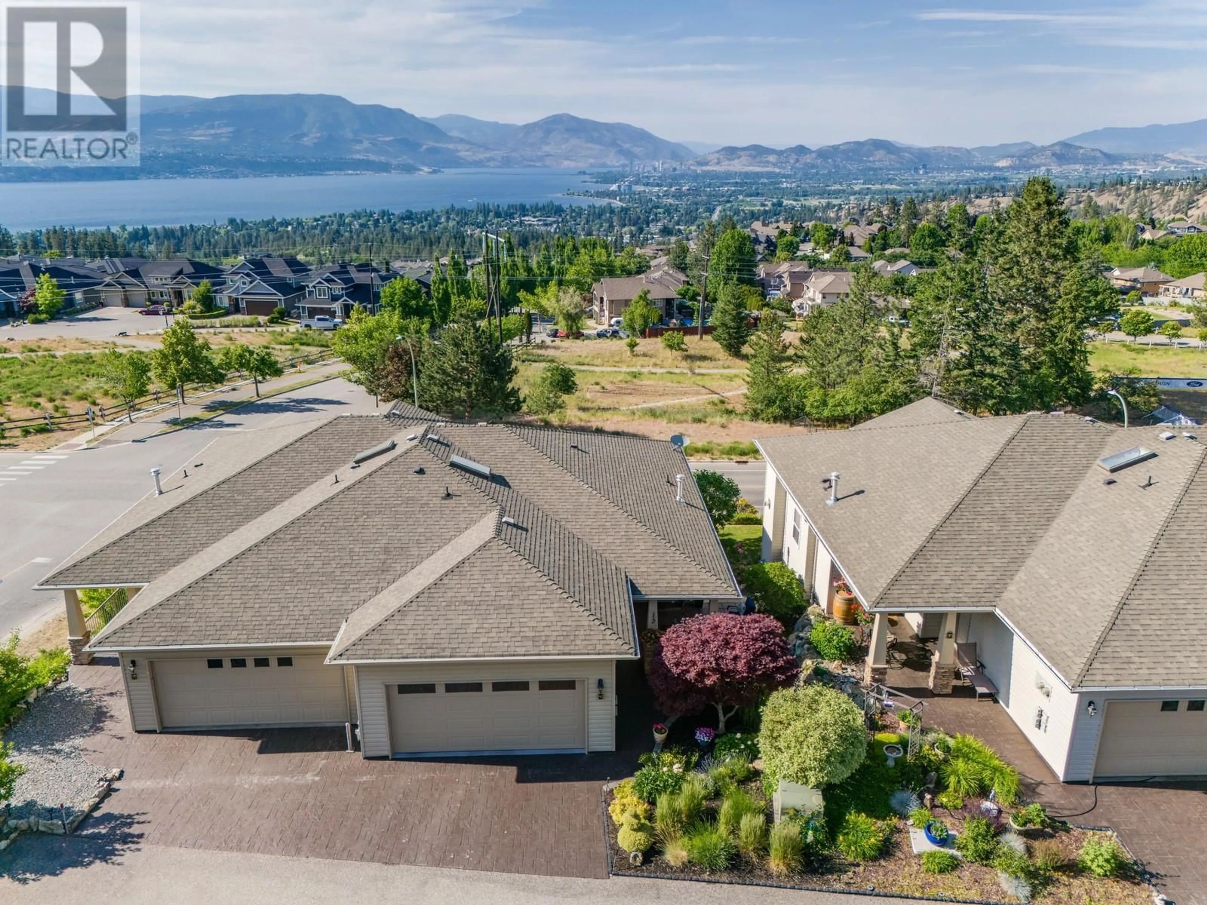 A pic from outside/outdoor area/front of a property/back of a property/a pic from drone, water/lake/river/ocean view for 2 - 700 SOUTH CREST DRIVE, Kelowna British Columbia V1W4X7