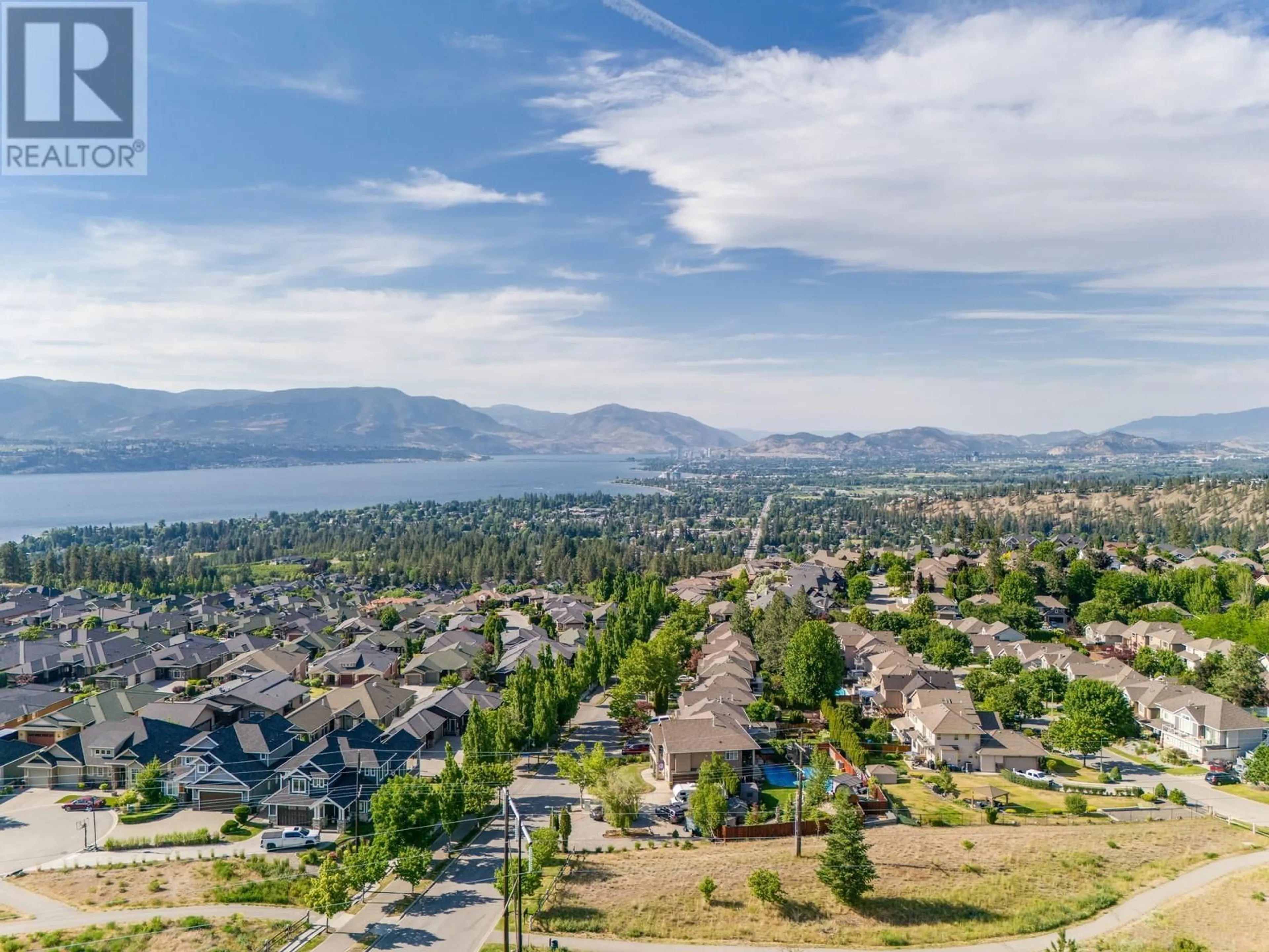 A pic from outside/outdoor area/front of a property/back of a property/a pic from drone, mountain view for 2 - 700 SOUTH CREST DRIVE, Kelowna British Columbia V1W4X7