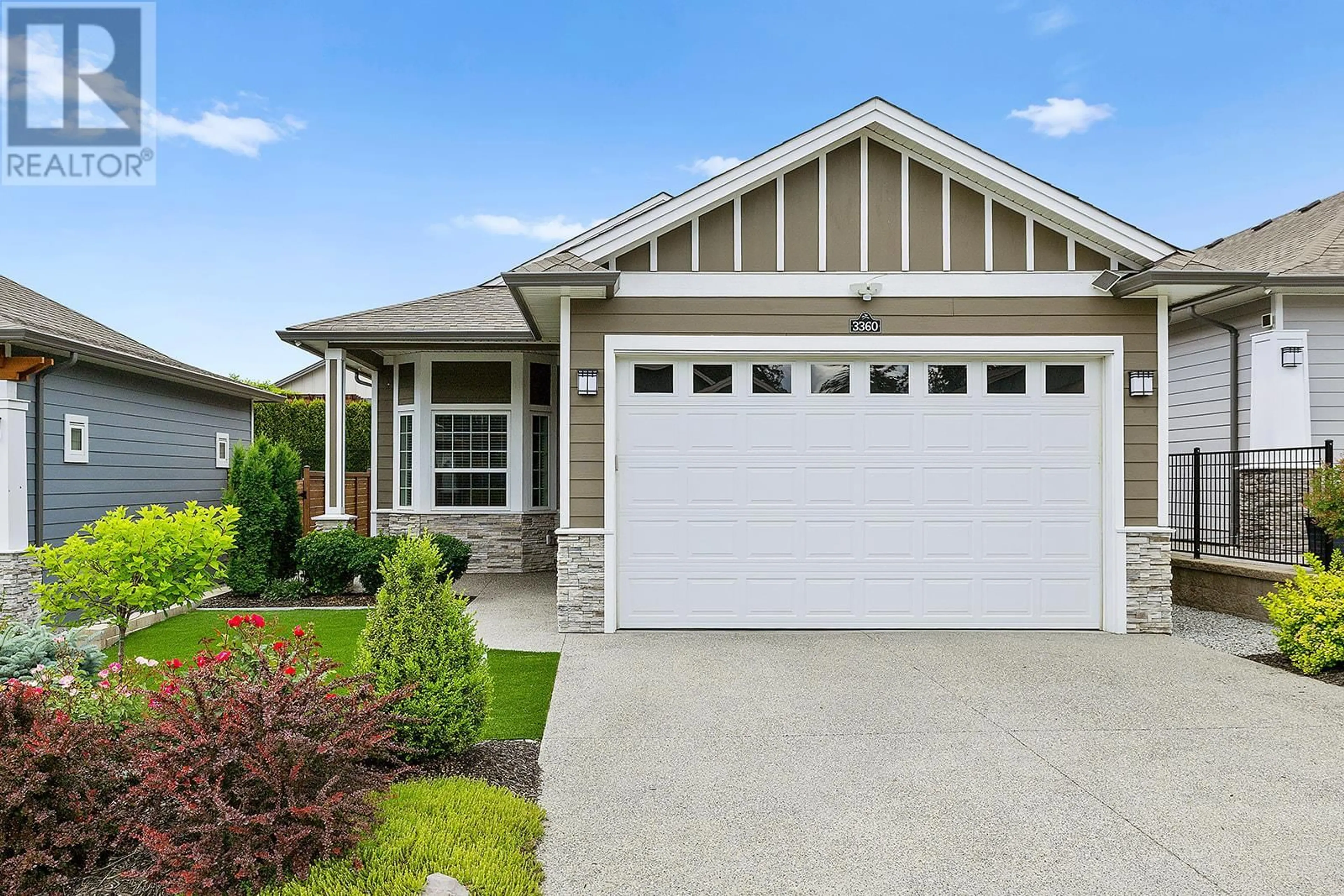 Home with vinyl exterior material, street for 3360 IRONWOOD DRIVE, Westbank British Columbia V4T0A9