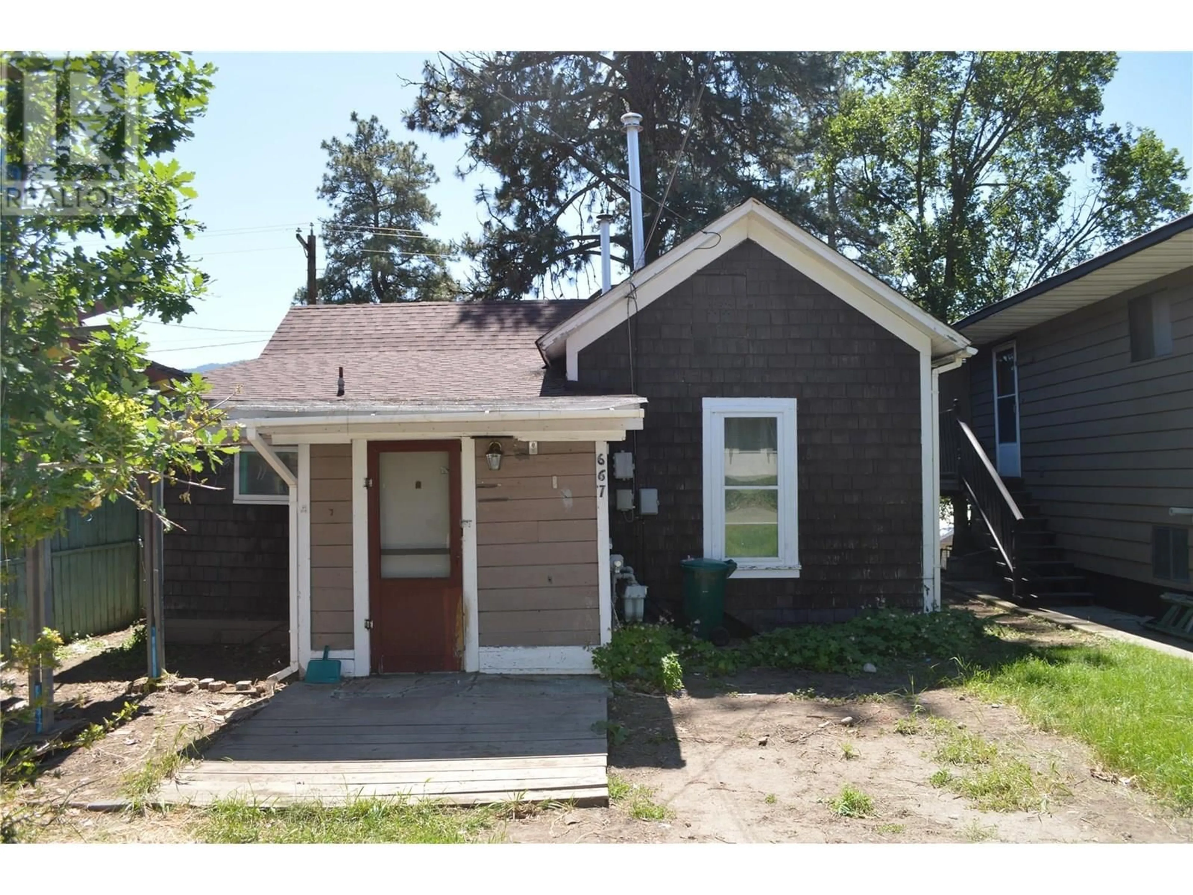 Home with vinyl exterior material, street for 667 72ND AVENUE, Grand Forks British Columbia V0H1H0