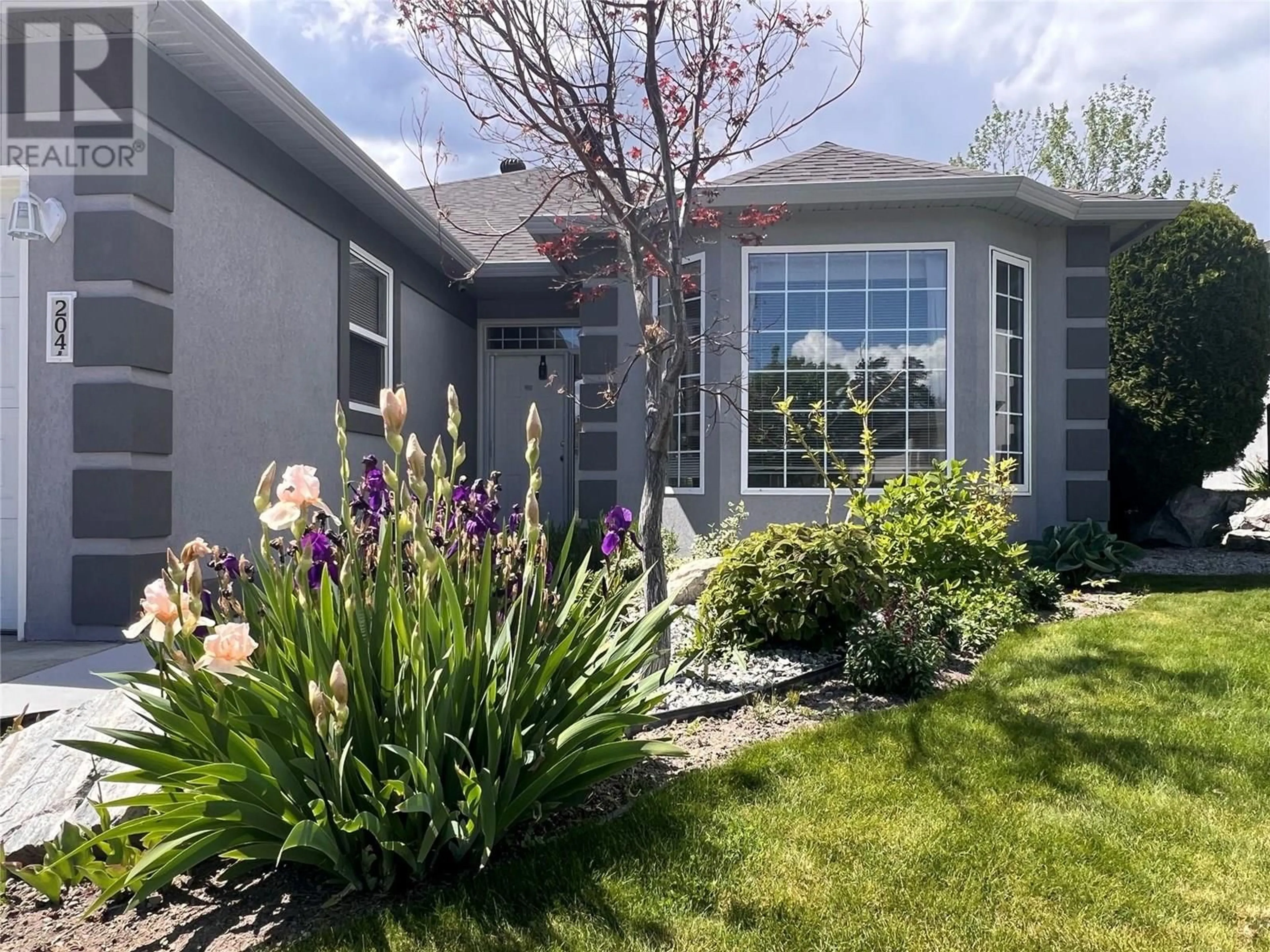 Home with vinyl exterior material, street for 204 - 3360 OLD OKANAGAN HIGHWAY, West Kelowna British Columbia V4T1X9
