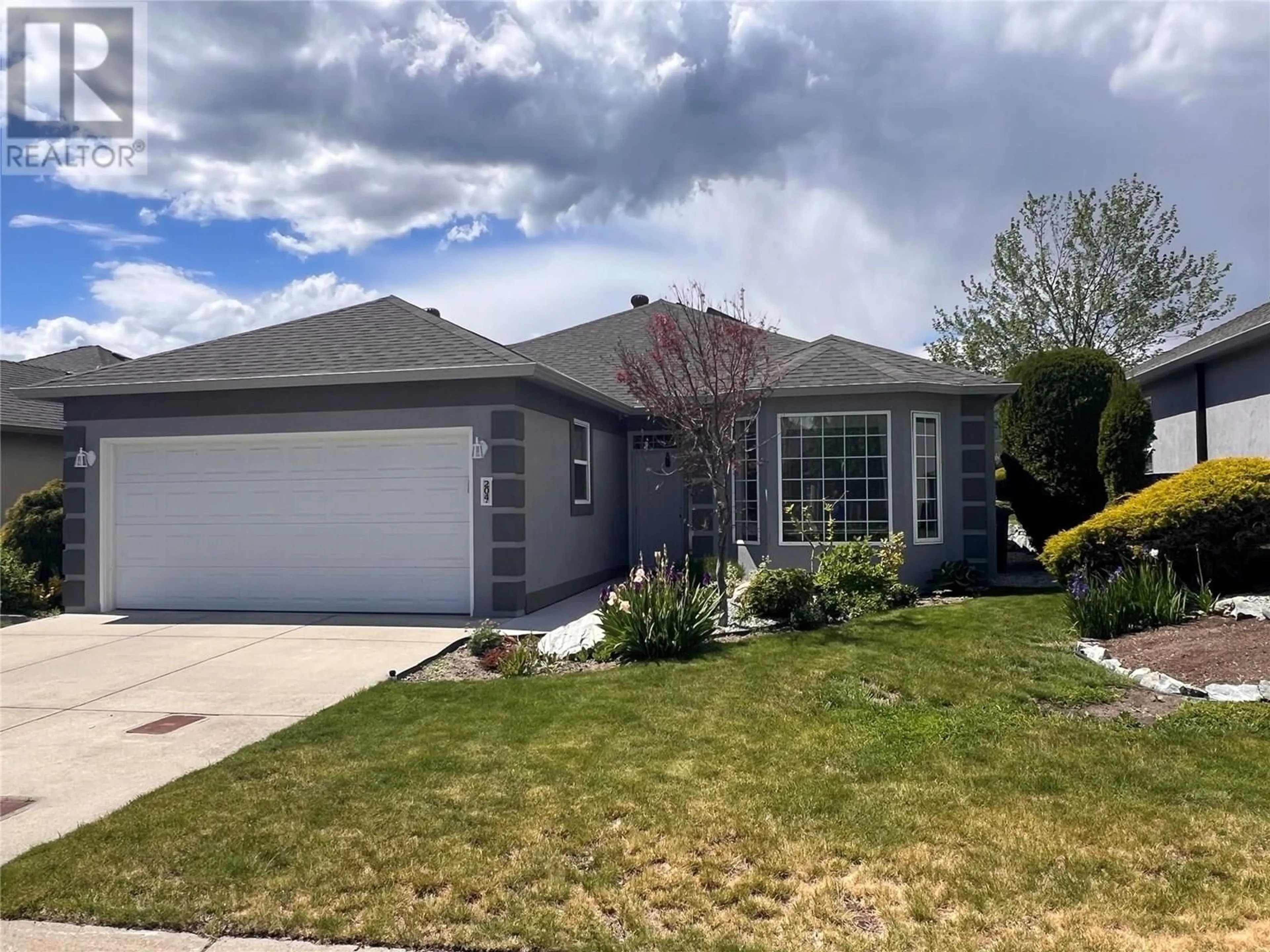 Home with vinyl exterior material, street for 204 - 3360 OLD OKANAGAN HIGHWAY, West Kelowna British Columbia V4T1X9
