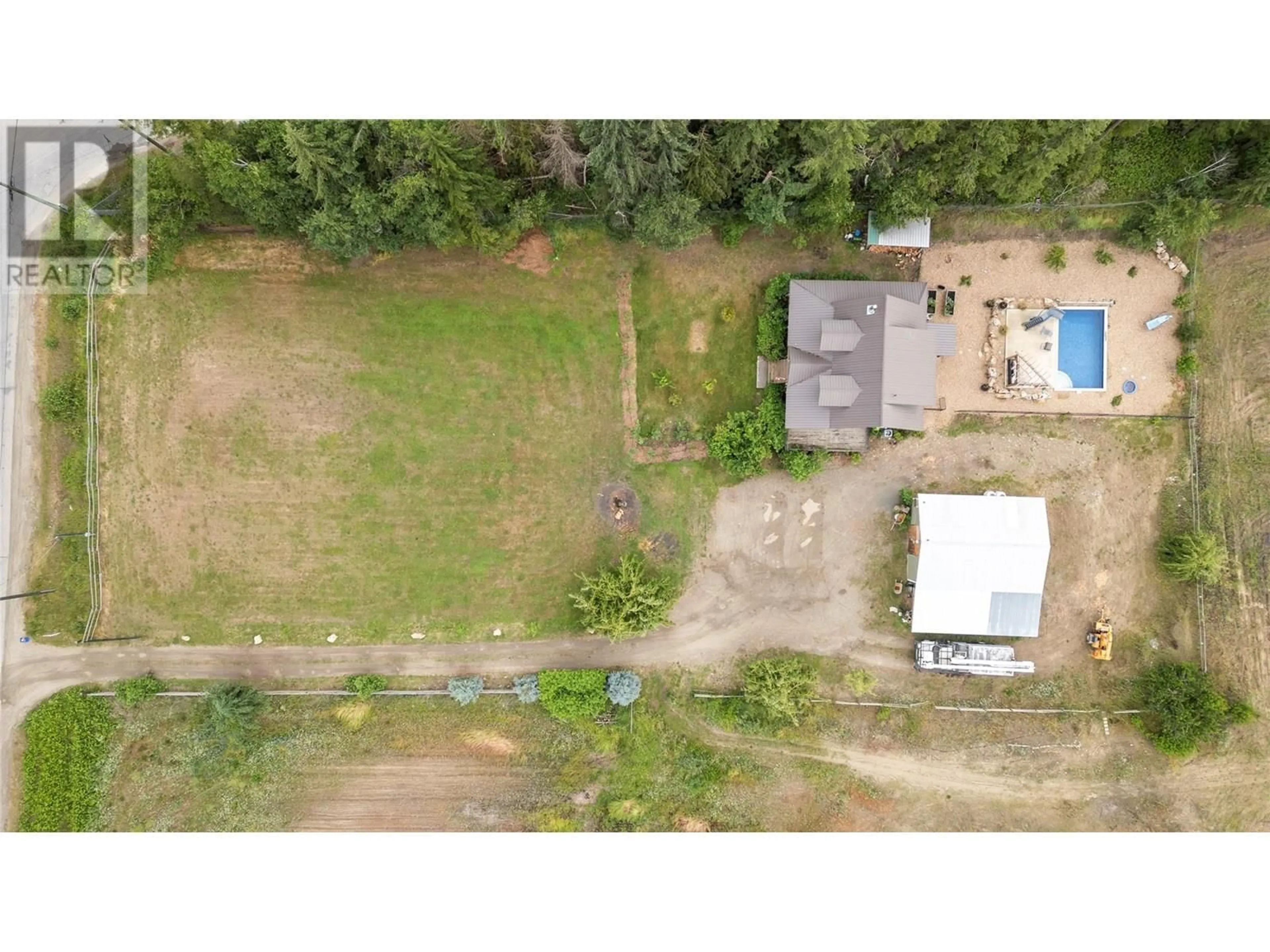 A pic from outside/outdoor area/front of a property/back of a property/a pic from drone, unknown for 4150 20 AVENUE SOUTHEAST, Salmon Arm British Columbia V1E1X9