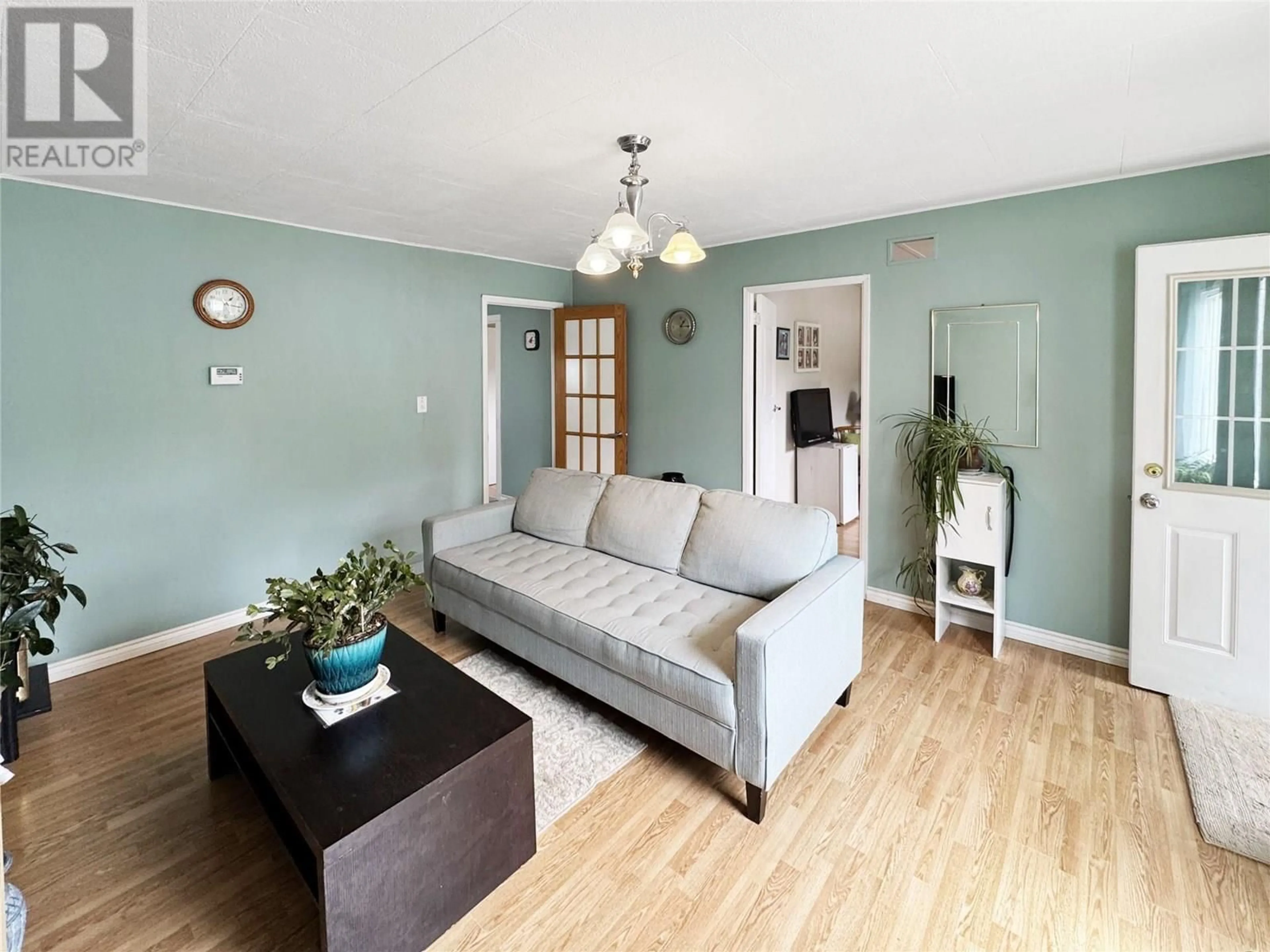 Living room with furniture, wood/laminate floor for 297 LACHINE AVENUE, Princeton British Columbia V0X1W0