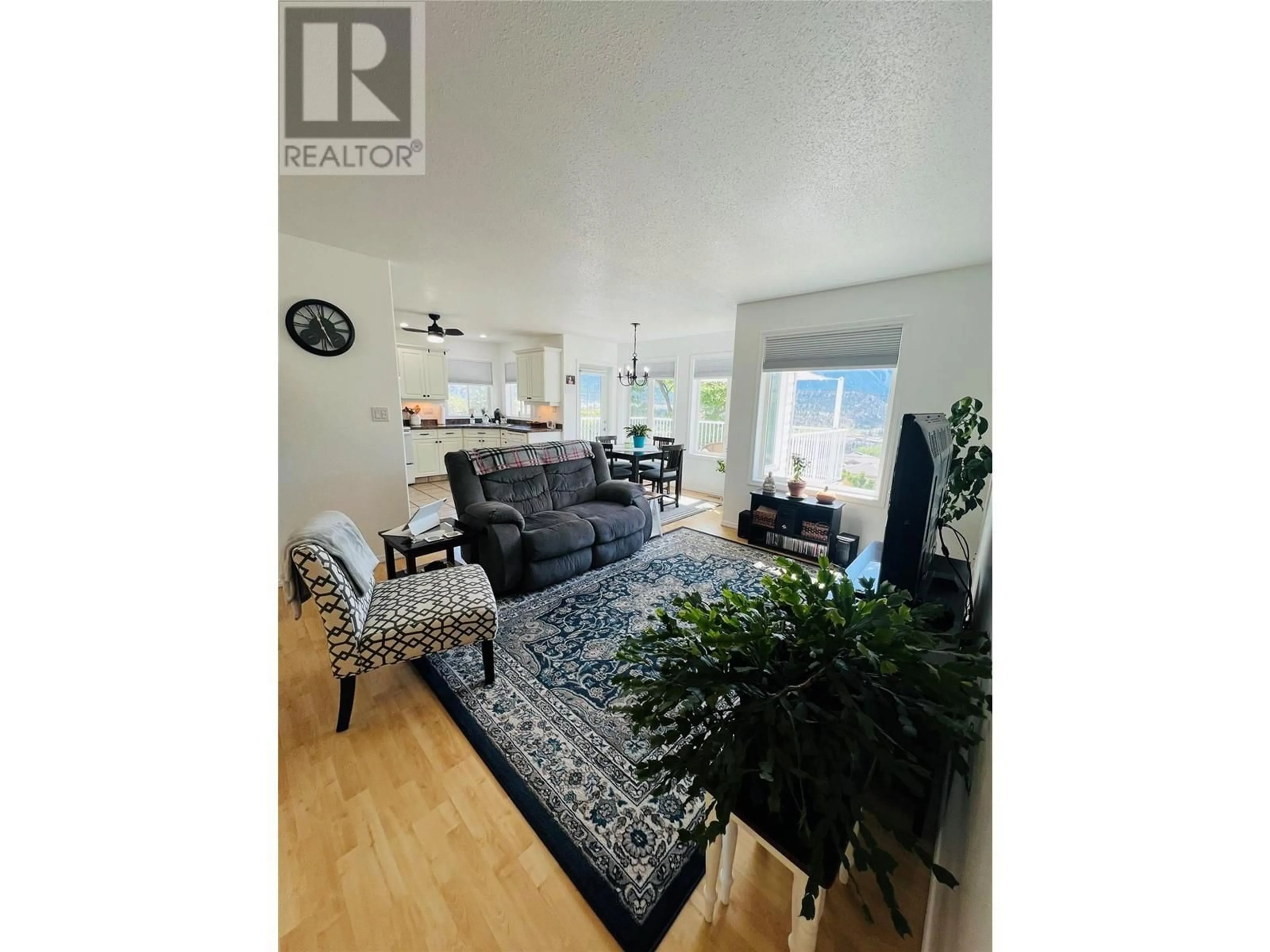 Living room with furniture, wood/laminate floor for 566 VICTORIA STREET, Lillooet British Columbia V0K1V0