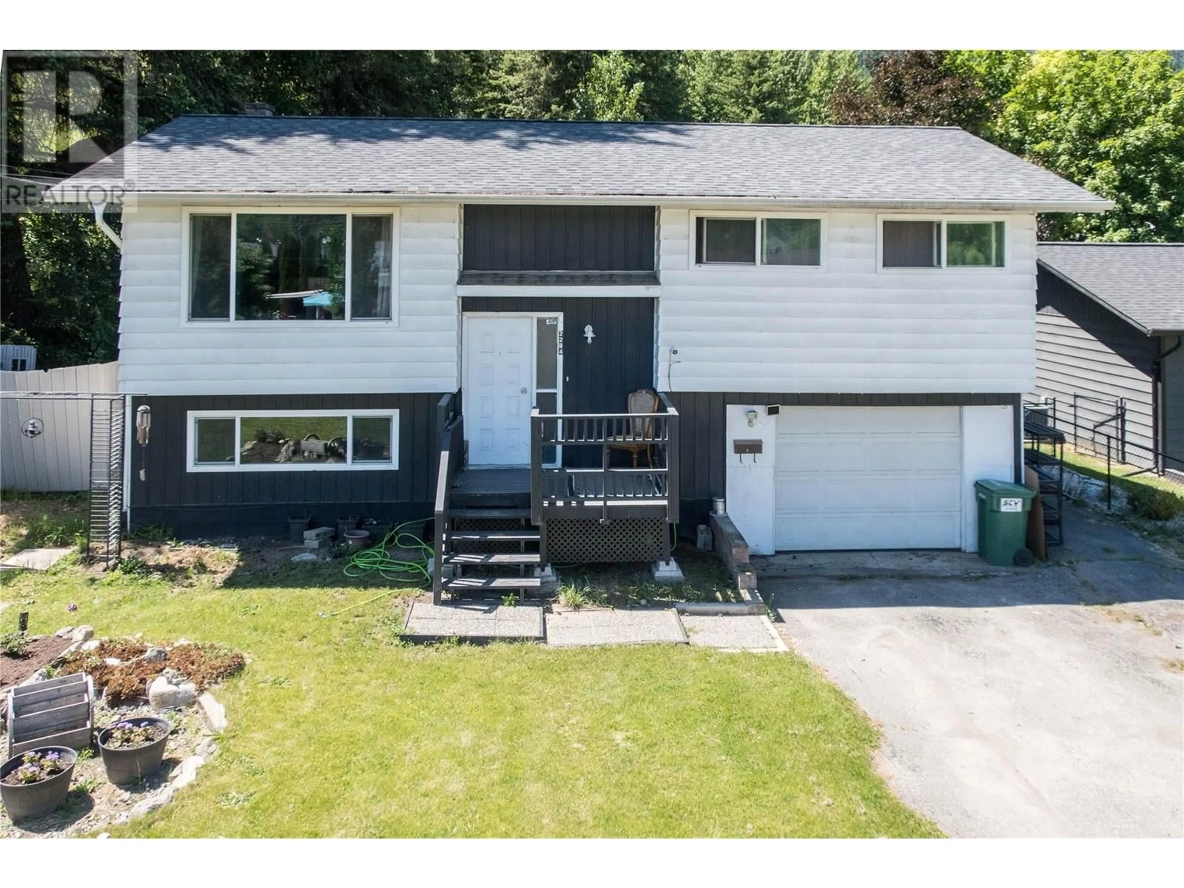 Home with vinyl exterior material, street for 2284 PARK AVENUE, Lumby British Columbia V0E2G0