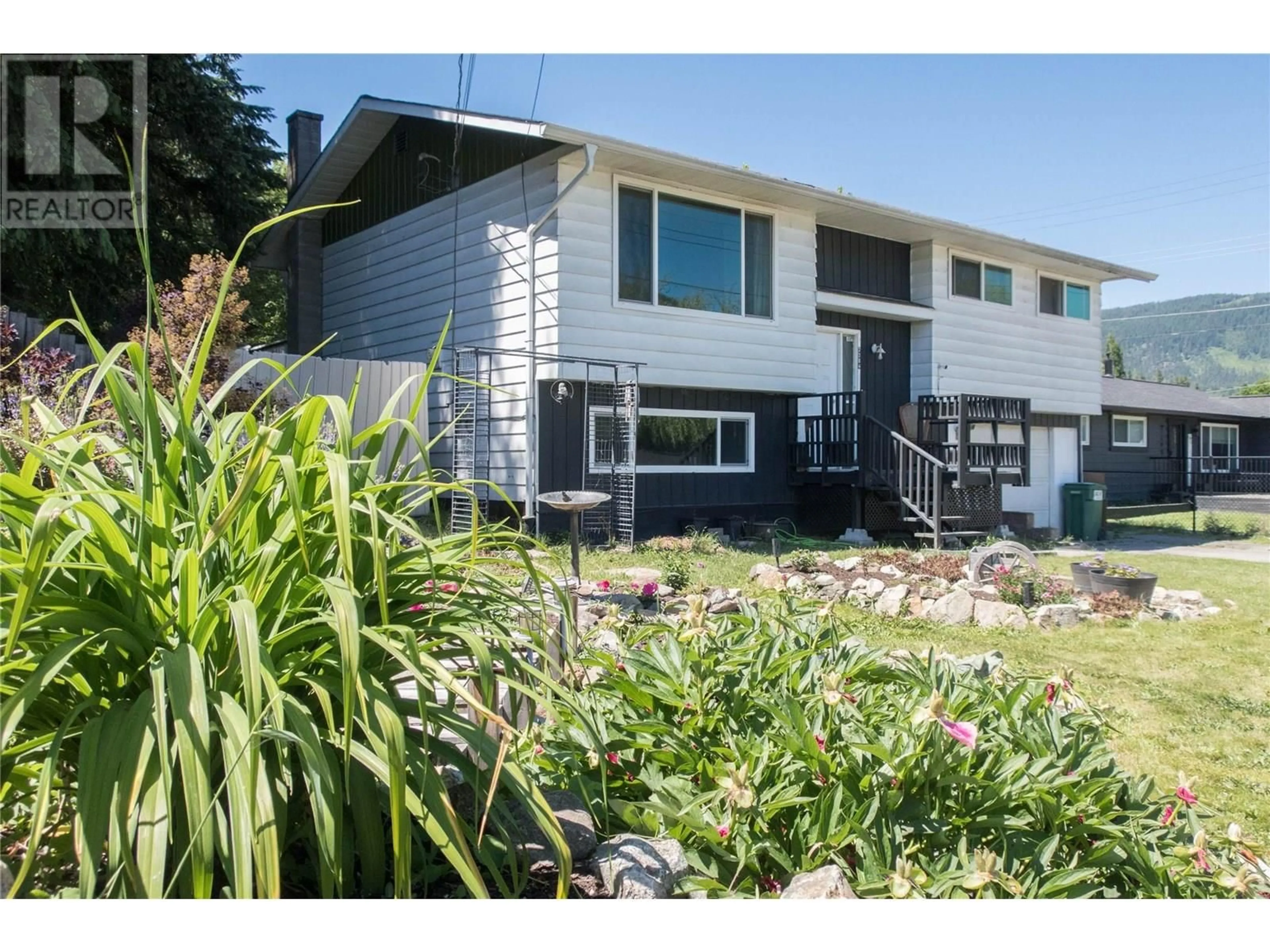 Home with vinyl exterior material, street for 2284 PARK AVENUE, Lumby British Columbia V0E2G0