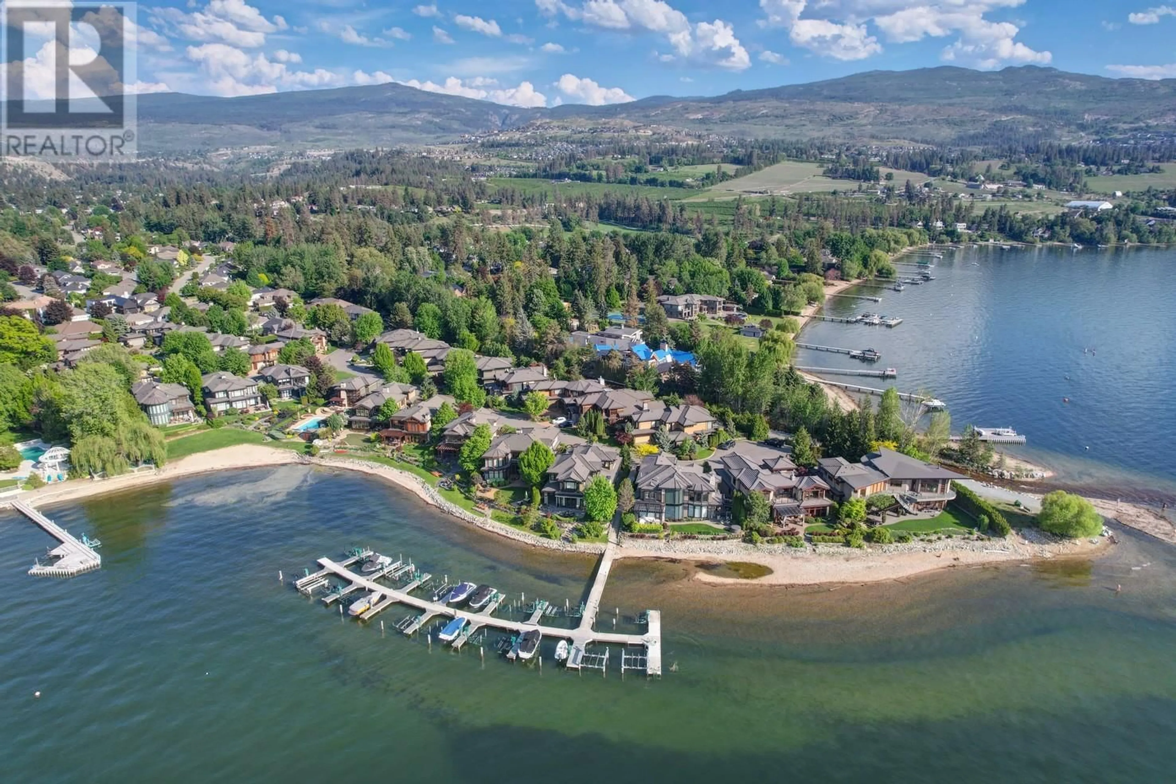 A pic from outside/outdoor area/front of a property/back of a property/a pic from drone, water/lake/river/ocean view for 104 - 440 CASCIA DRIVE, Kelowna British Columbia V1W4Y4