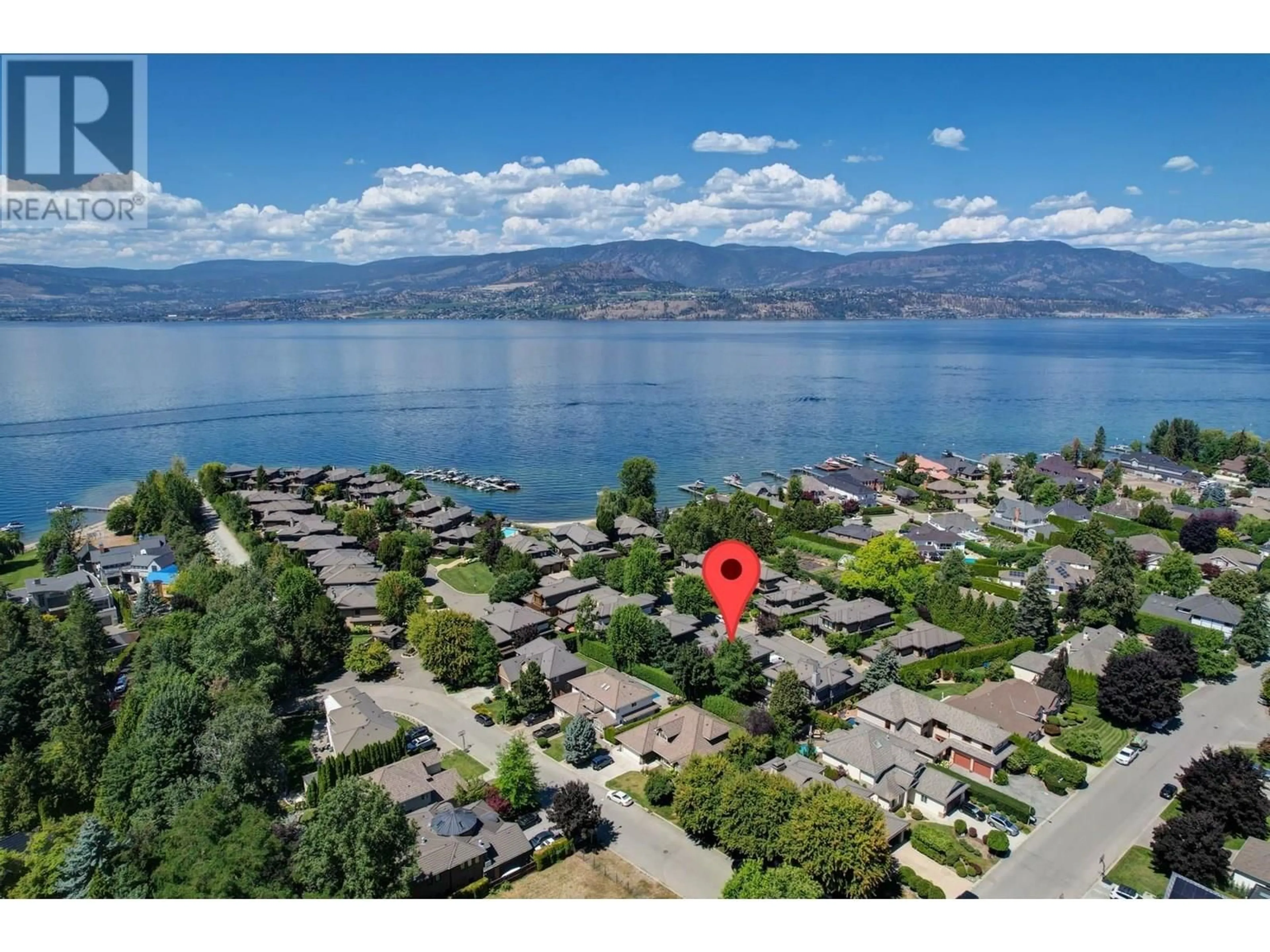 A pic from outside/outdoor area/front of a property/back of a property/a pic from drone, water/lake/river/ocean view for 104 - 440 CASCIA DRIVE, Kelowna British Columbia V1W4Y4