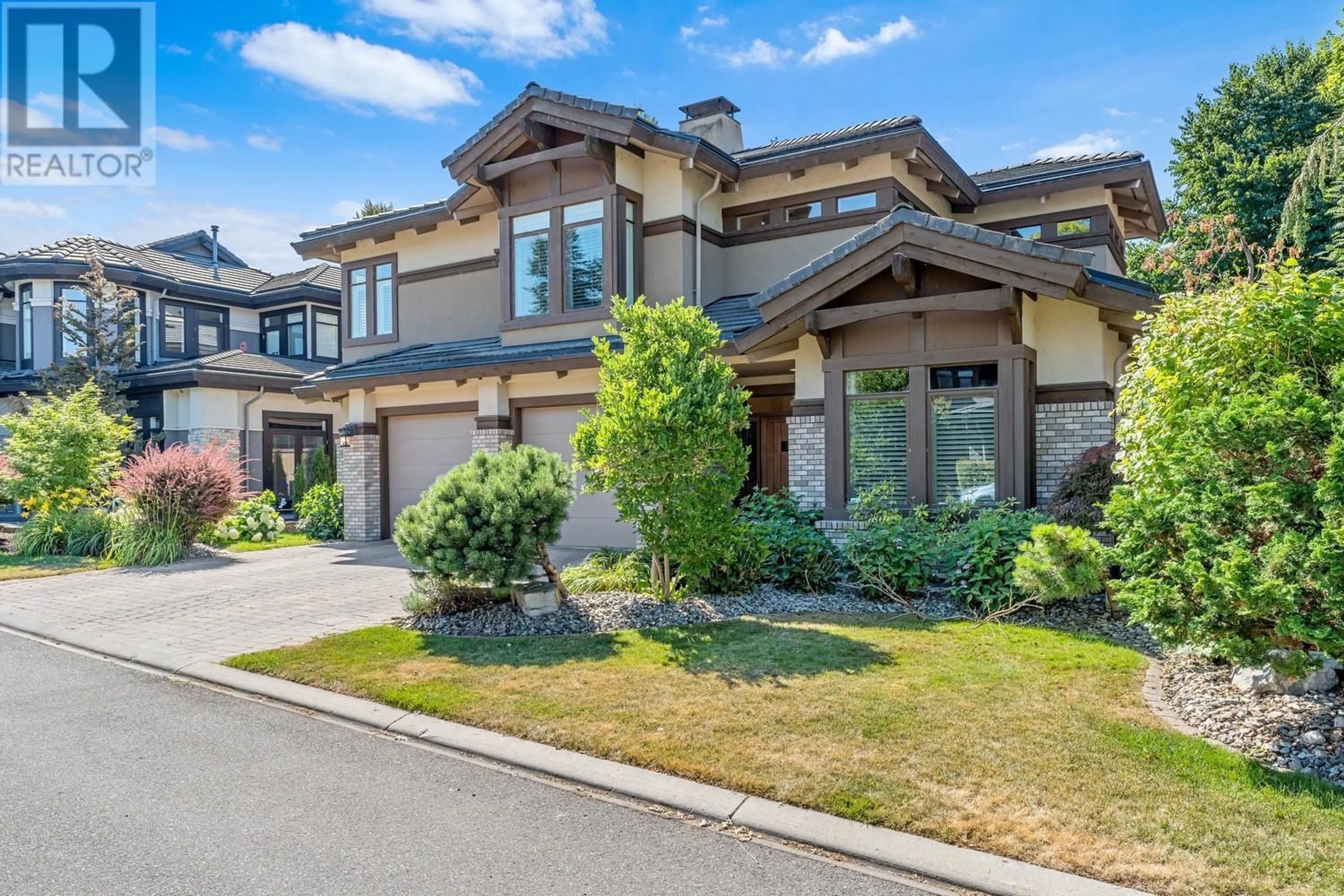 Home with brick exterior material, street for 104 - 440 CASCIA DRIVE, Kelowna British Columbia V1W4Y4
