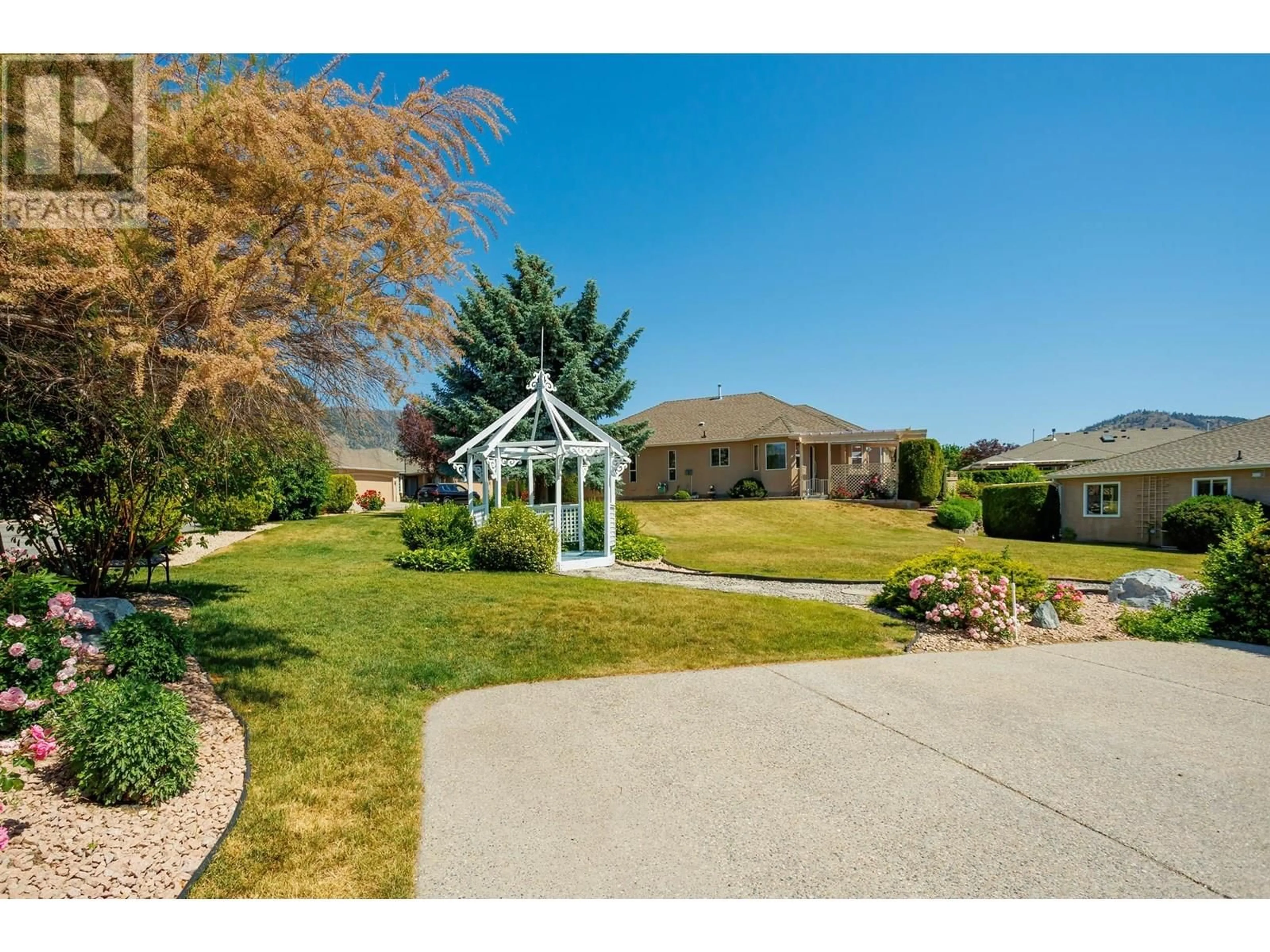 A pic from outside/outdoor area/front of a property/back of a property/a pic from drone, street for 139 - 2250 LOUIE DRIVE, Westbank British Columbia V4T2M6