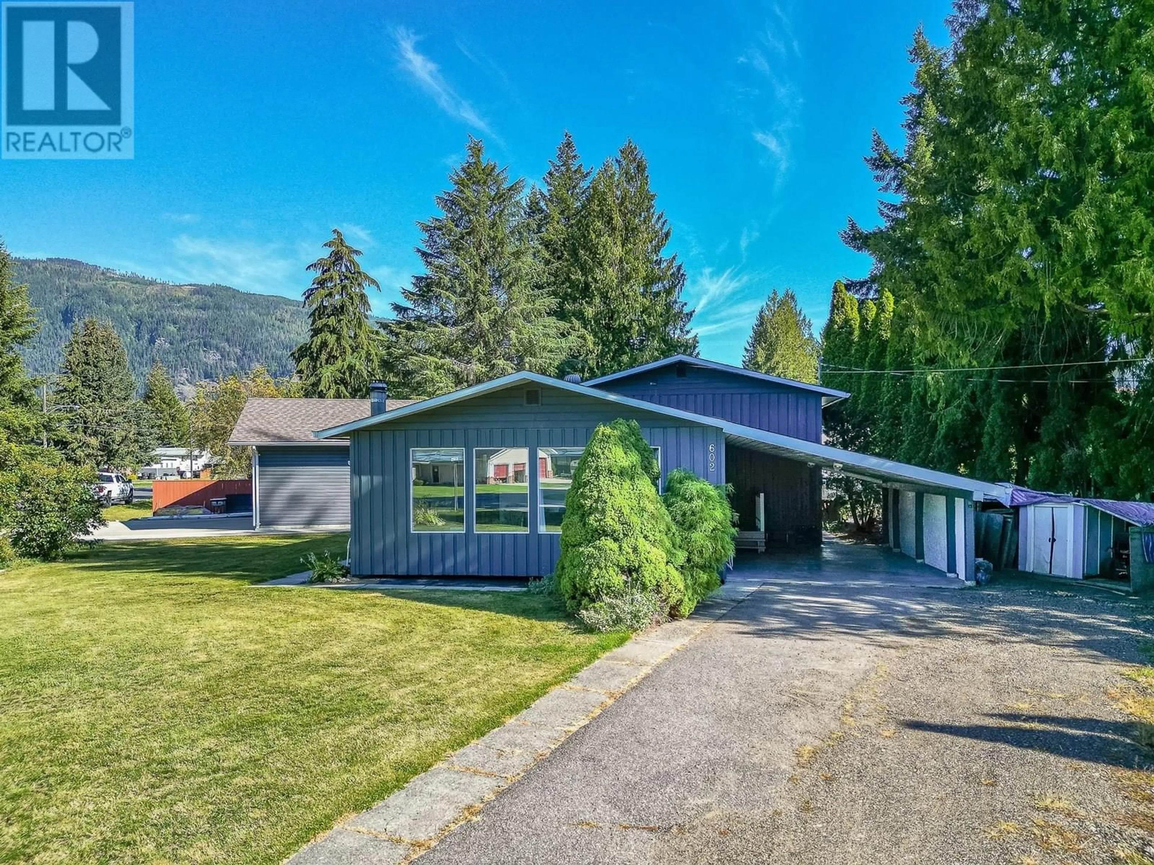 A pic from outside/outdoor area/front of a property/back of a property/a pic from drone, mountain view for 602 MAPLE STREET, Sicamous British Columbia V0E2V1