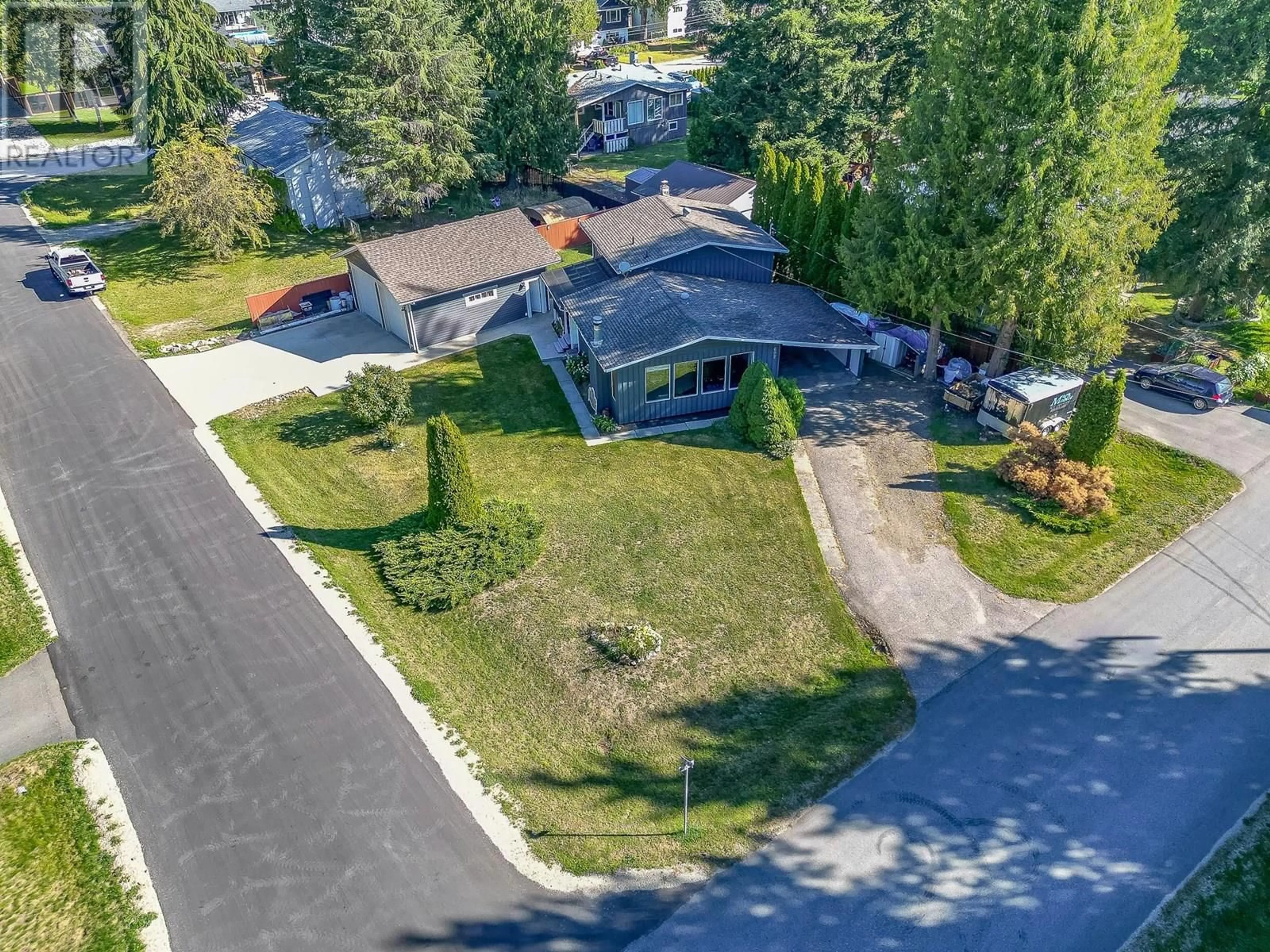 A pic from outside/outdoor area/front of a property/back of a property/a pic from drone, street for 602 MAPLE STREET, Sicamous British Columbia V0E2V1