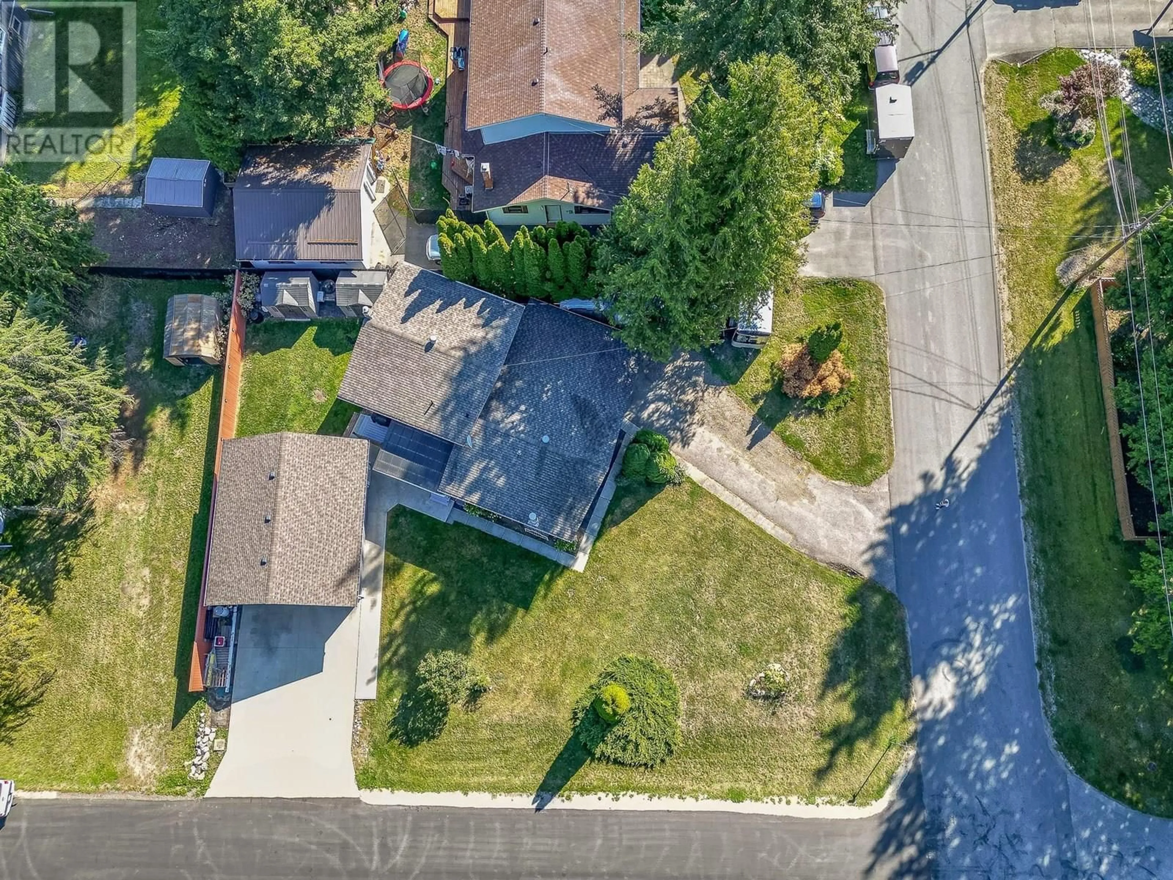 A pic from outside/outdoor area/front of a property/back of a property/a pic from drone, street for 602 MAPLE STREET, Sicamous British Columbia V0E2V1