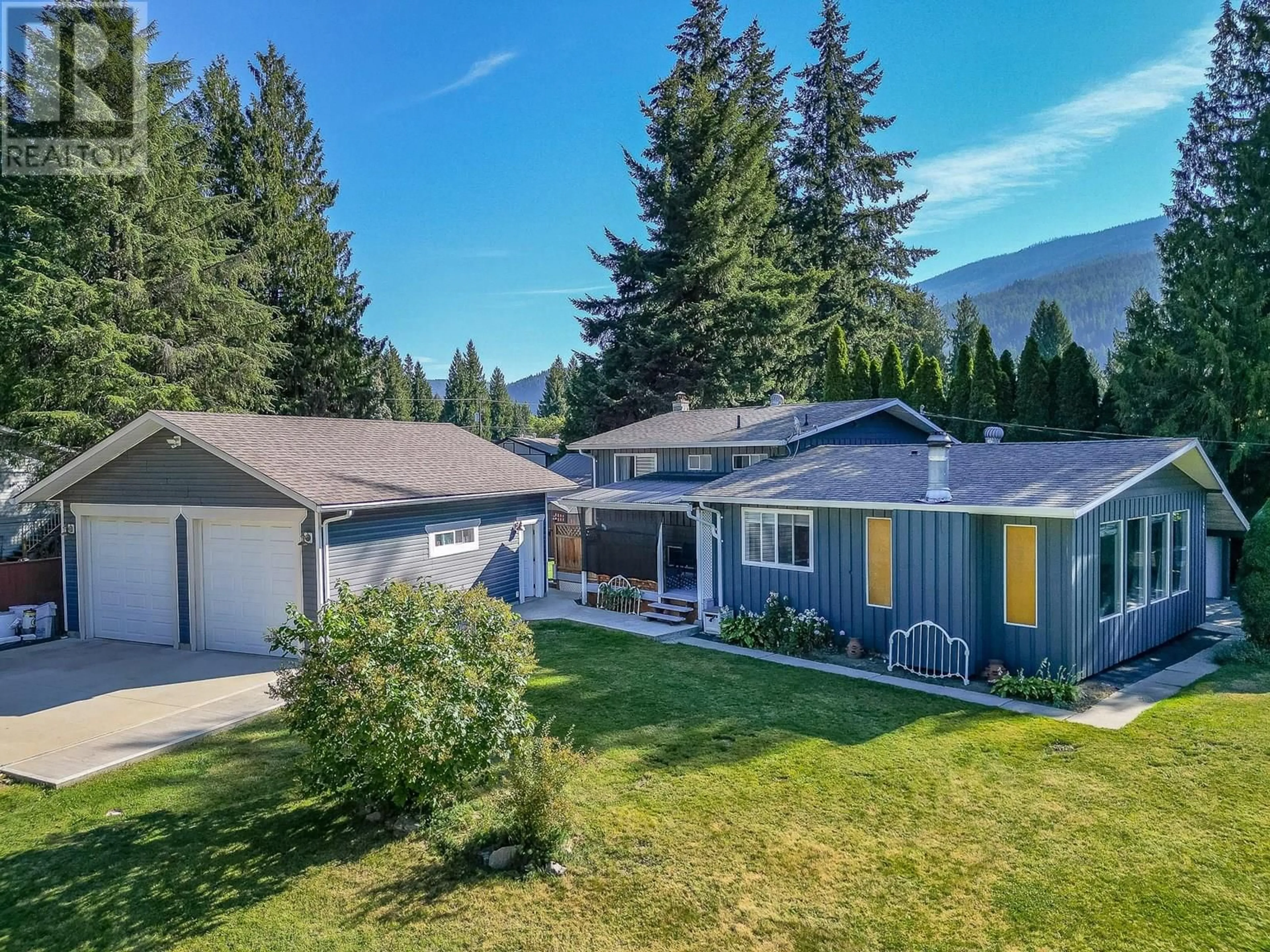 A pic from outside/outdoor area/front of a property/back of a property/a pic from drone, mountain view for 602 MAPLE STREET, Sicamous British Columbia V0E2V1